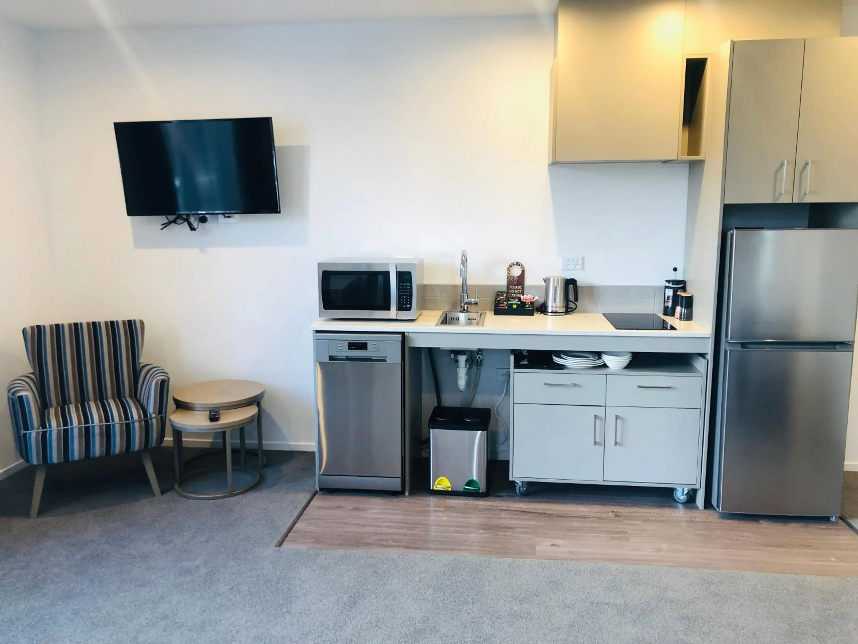 Kitchen or kitchenette in Ramada by Wyndham Queenstown Central