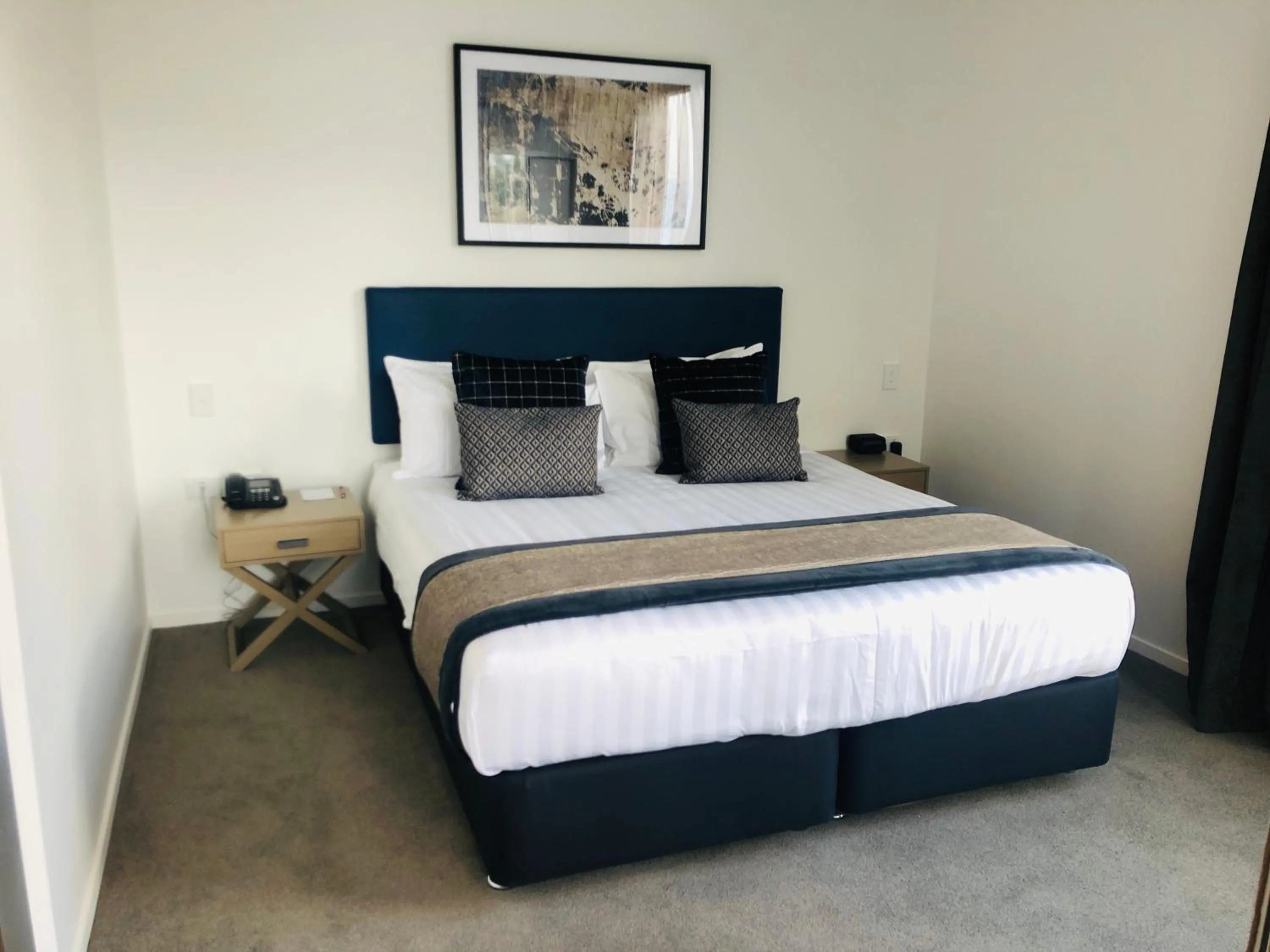 Bed in Ramada by Wyndham Queenstown Central