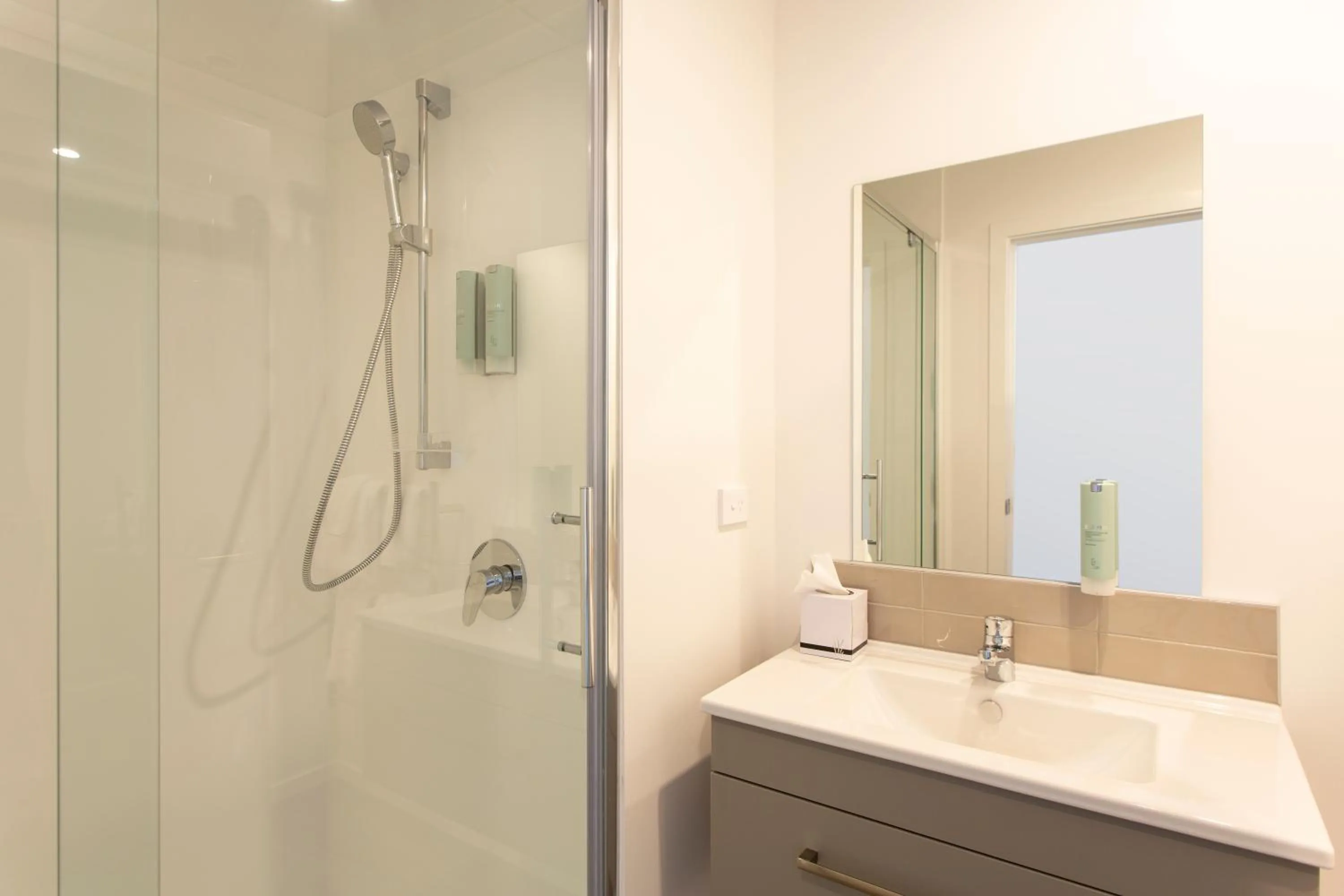 Shower in Ramada by Wyndham Queenstown Central