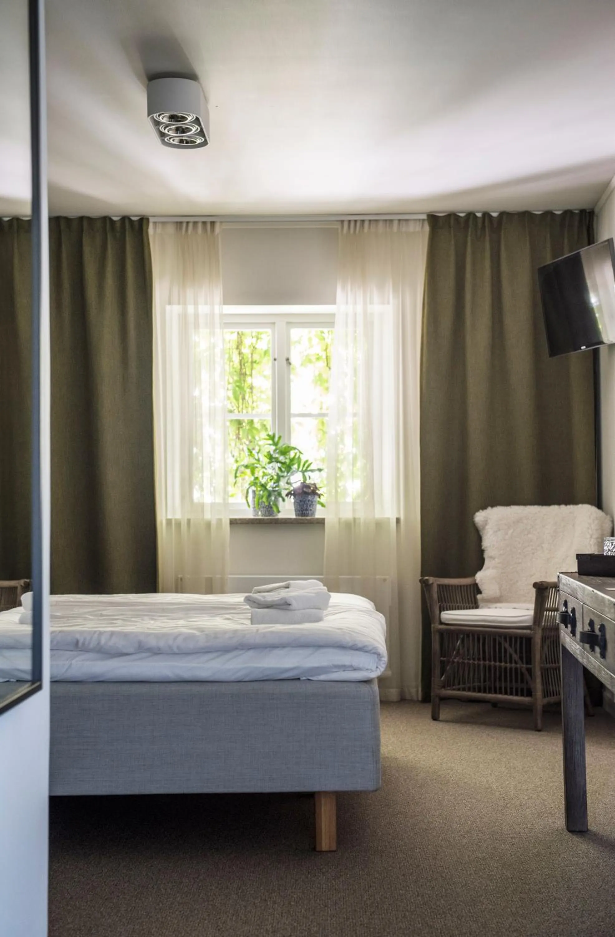 Photo of the whole room, Bed in Värdshuset Lindgården