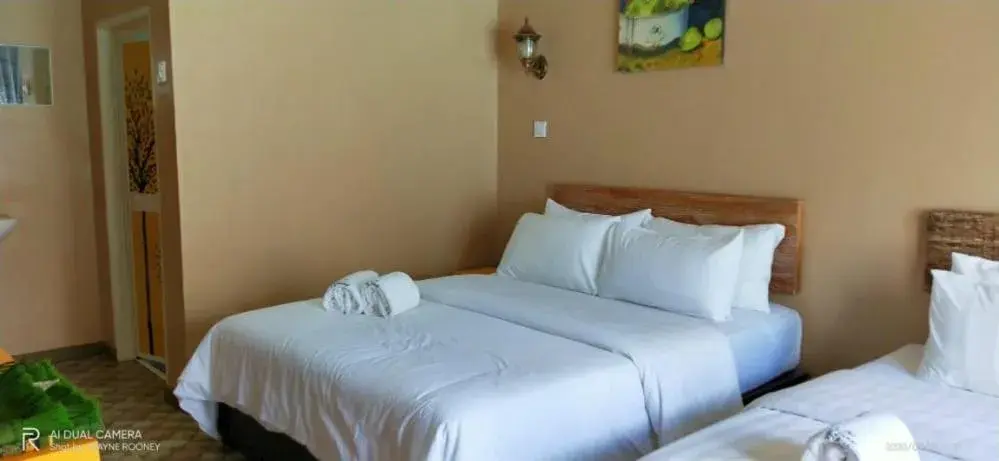 Bed in The Serai Cottage Downtown Hotel Bed in The Serai Cottage Downtown Hotel