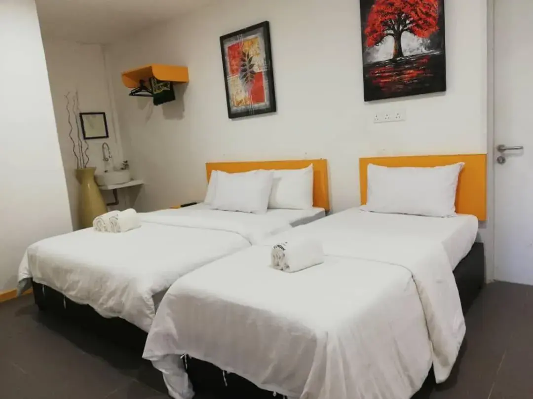 Bed in The Serai Cottage Downtown Hotel Bed in The Serai Cottage Downtown Hotel