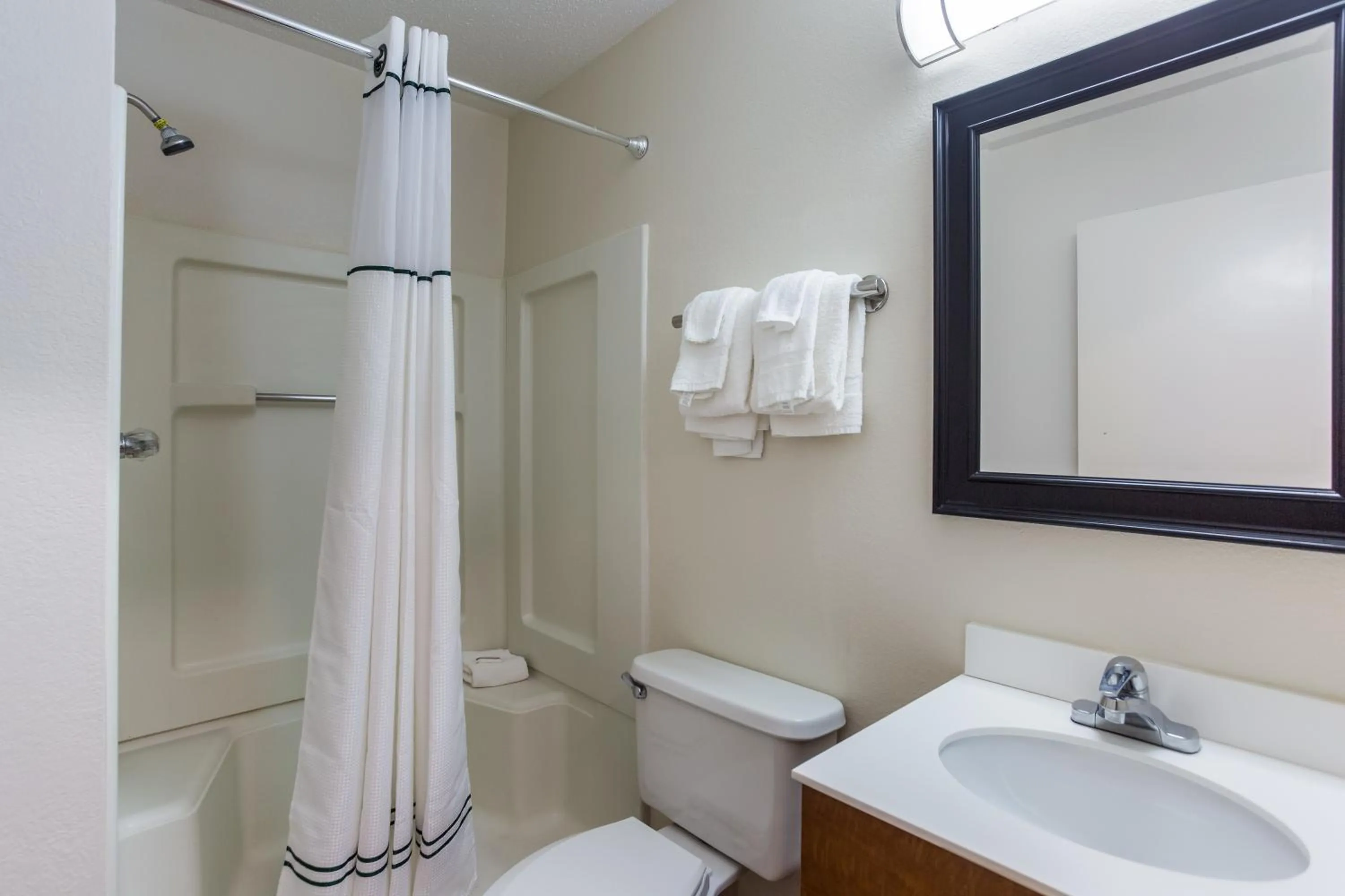 Photo of the whole room, Bathroom in HomeTowne Studios by Red Roof Nashville - Airport/Briley Pkwy