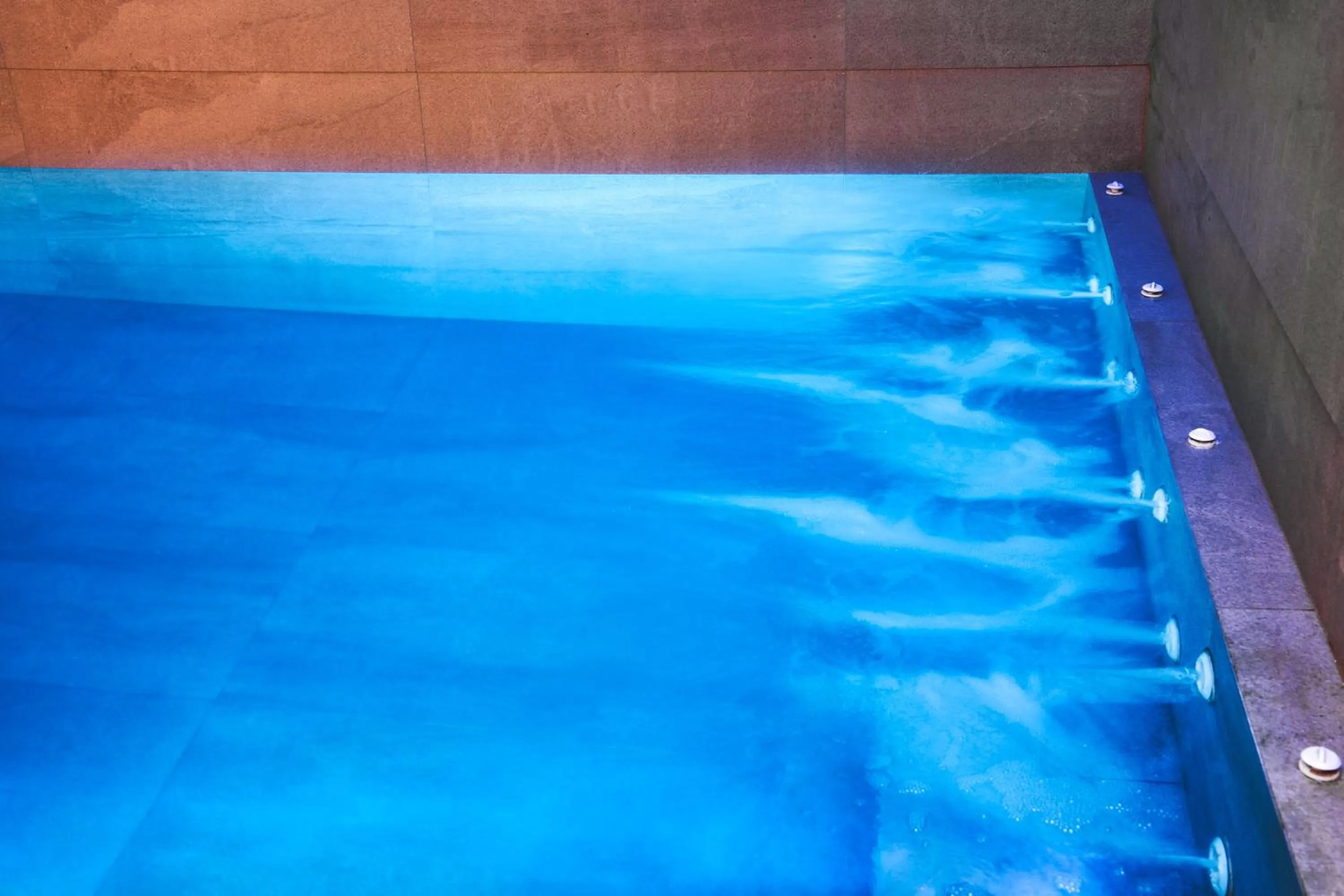 Swimming pool in Uma Ray Suites