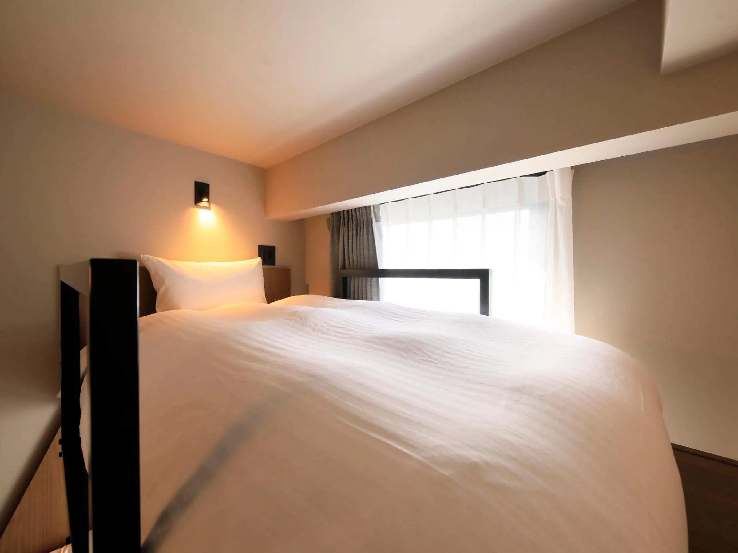 Bed in QuintessaHotel FukuokaHakata Relax&Sleep