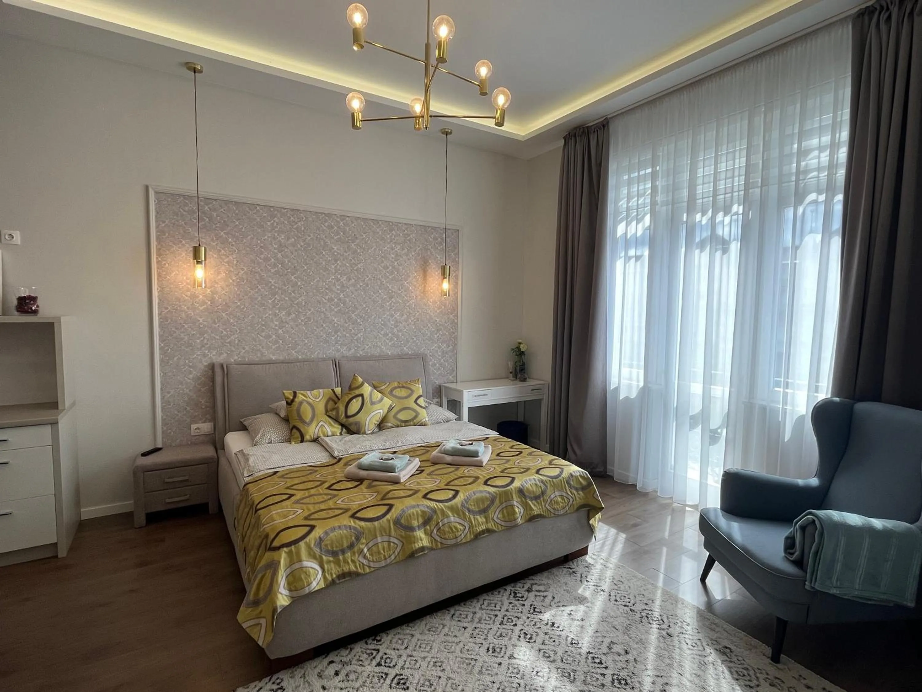 Bed in Visit Debrecen Apartman