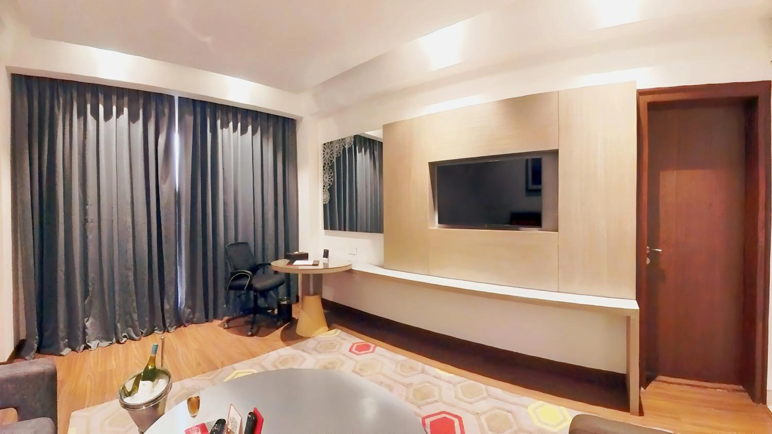 Living room in Ramada Plaza by Wyndham Lucknow