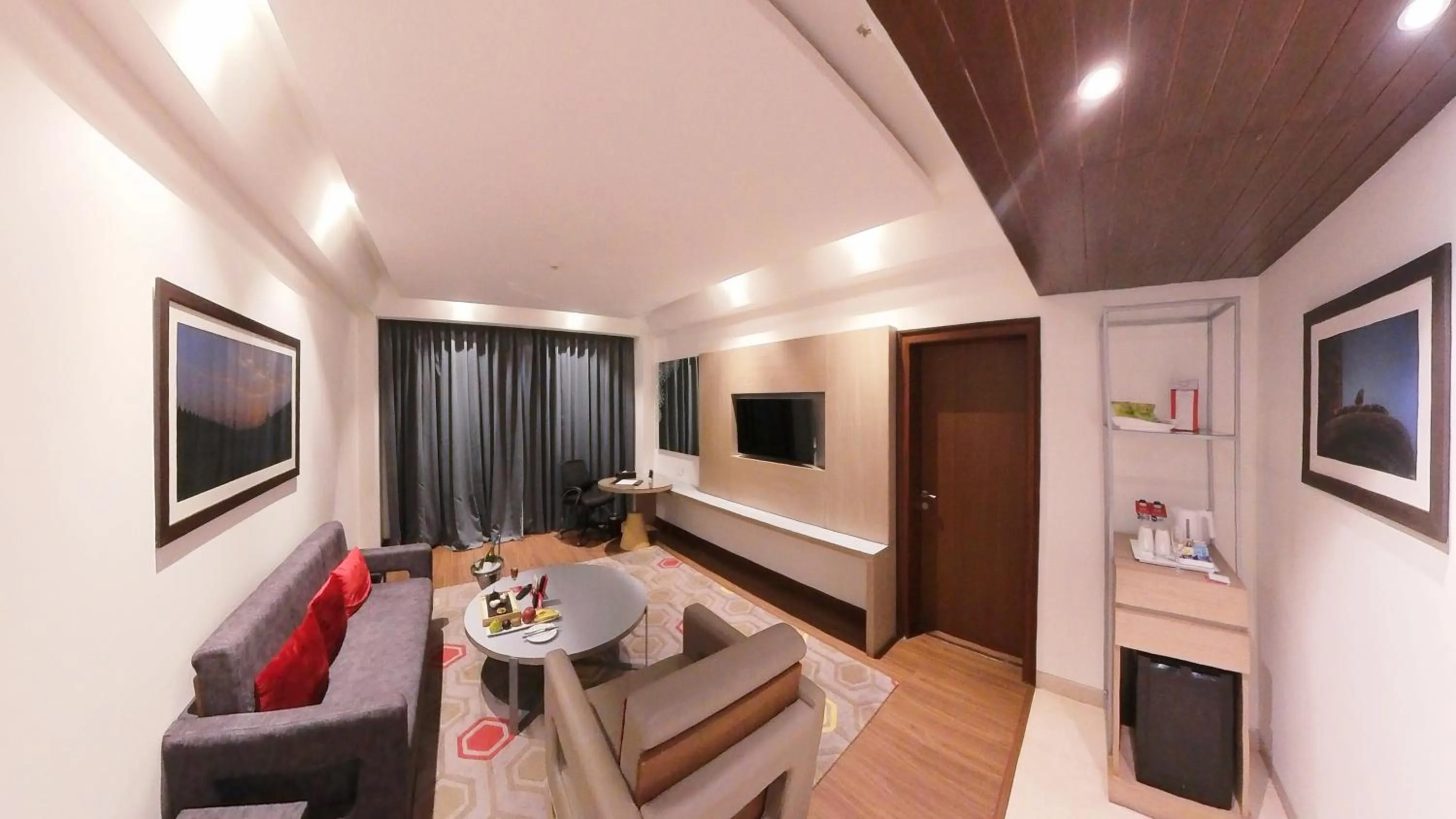 Living room in Ramada Plaza by Wyndham Lucknow