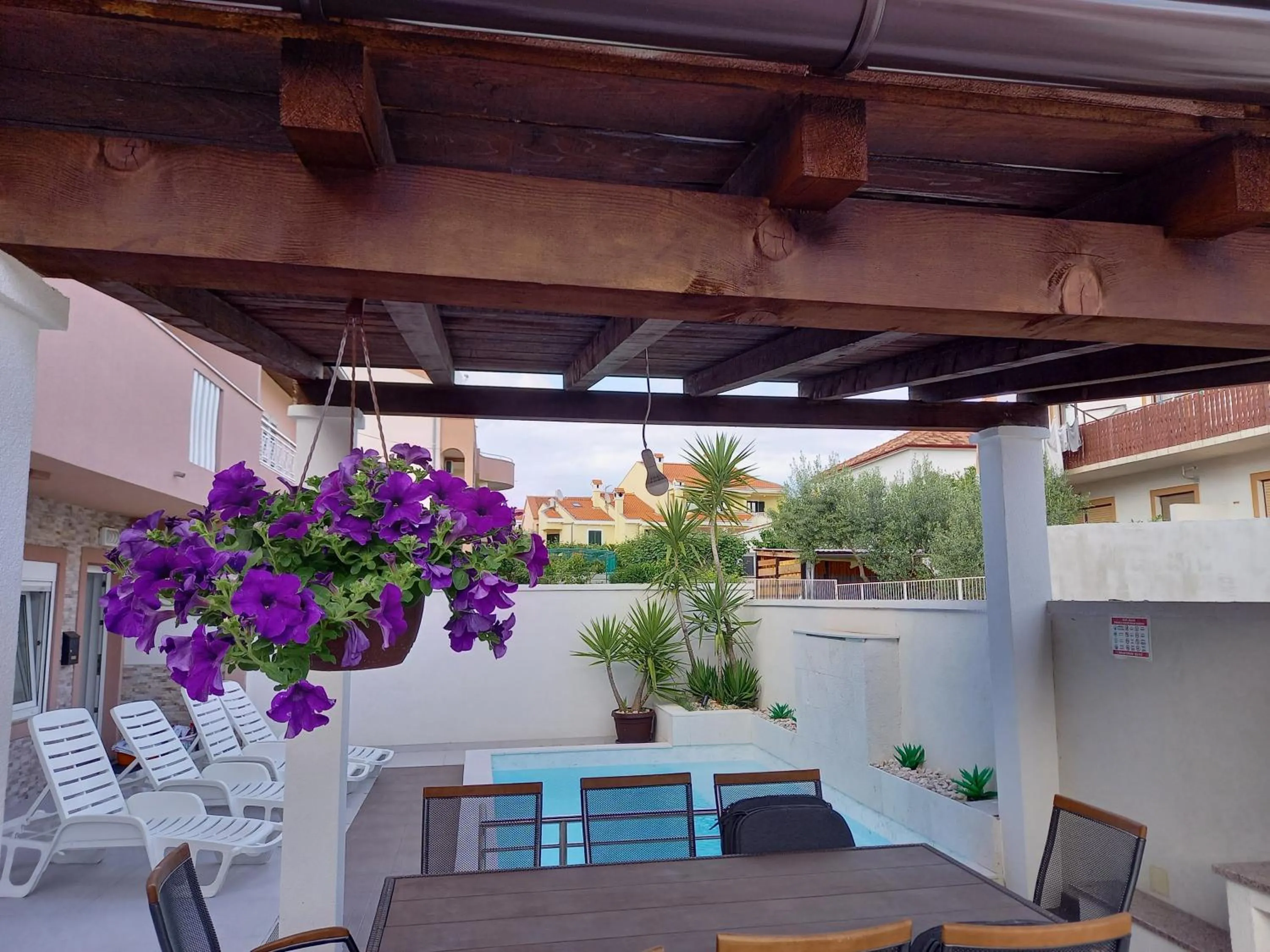 Apartments Benic with a heated pool