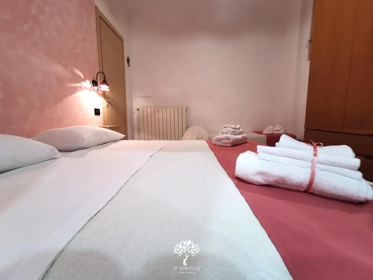 Bed in La Suscella Bed & Breakfast