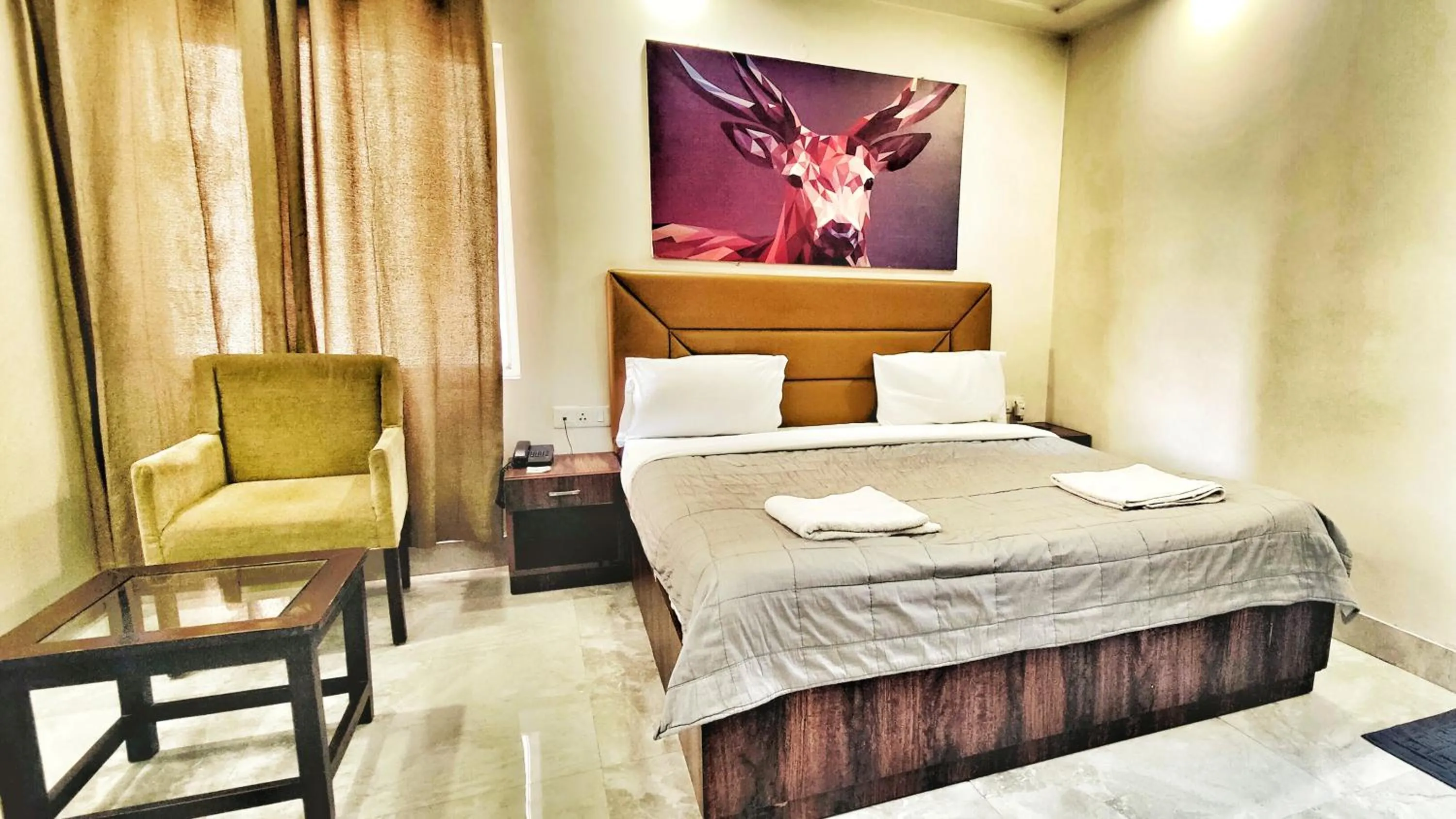 View (from property/room), Bed in Hotel Aerocity Purple Orchid