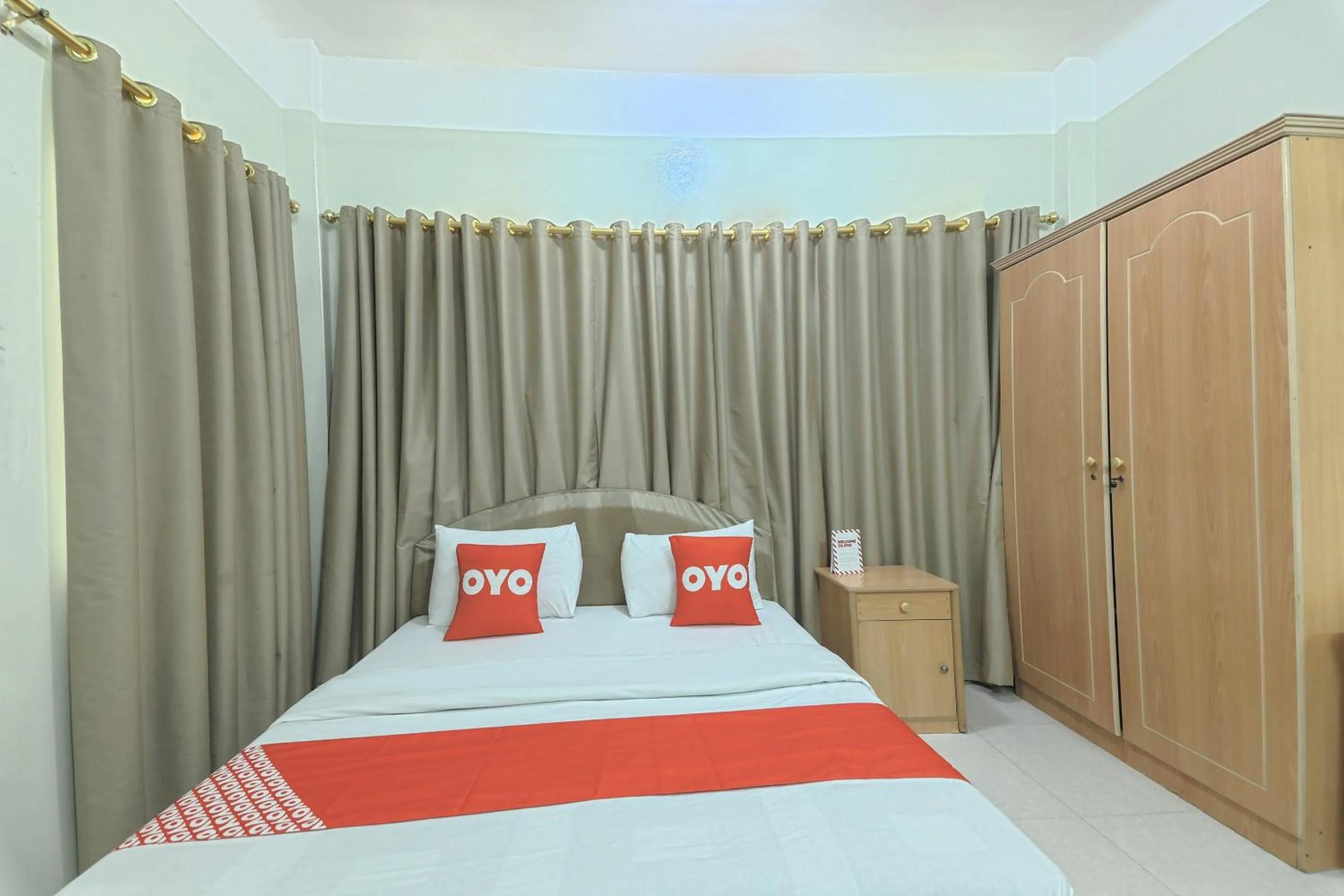 Bedroom in Super OYO 108 Marsa Al Masafar Hotel Apartment