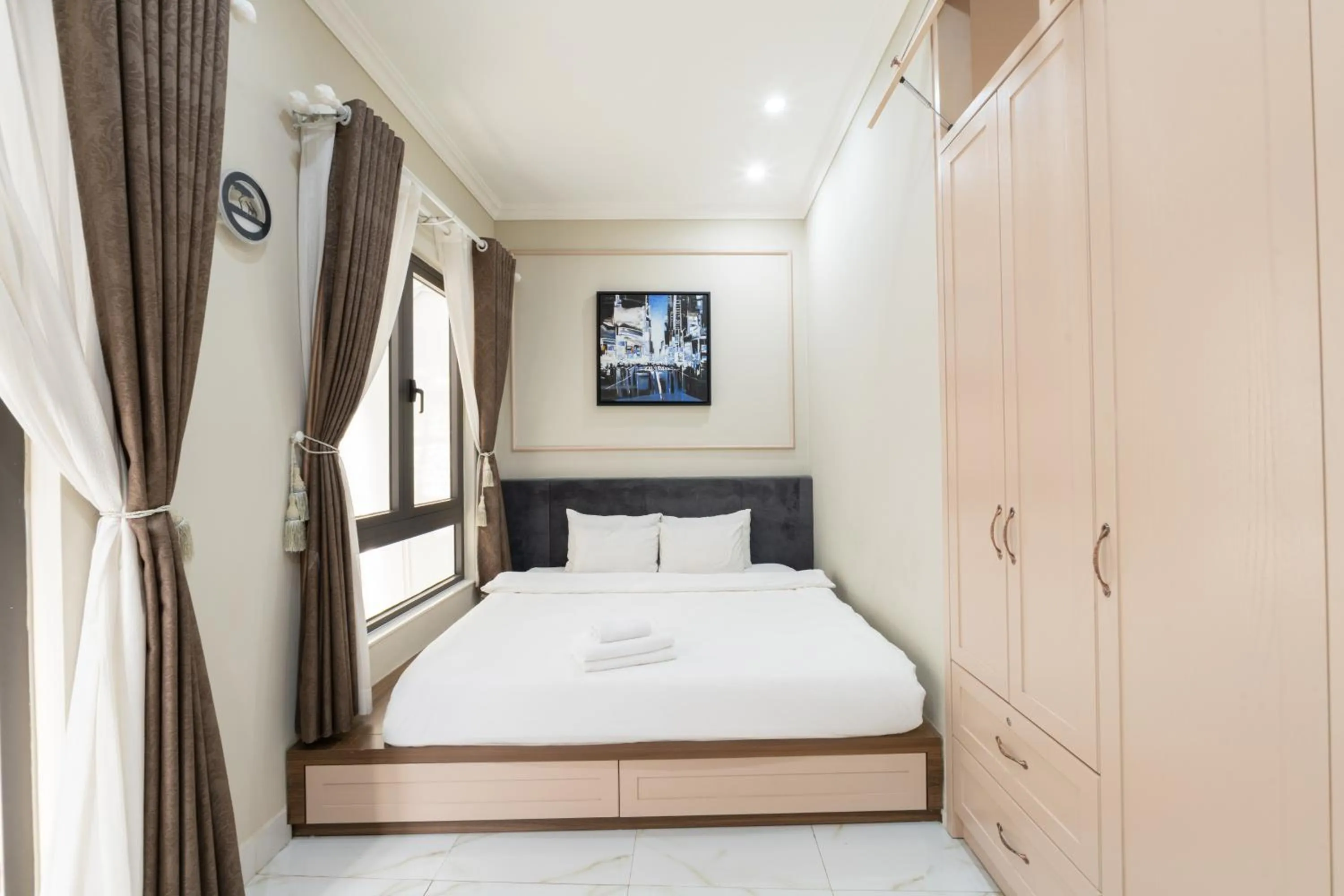 Bed in N Queen Apartment Hotel