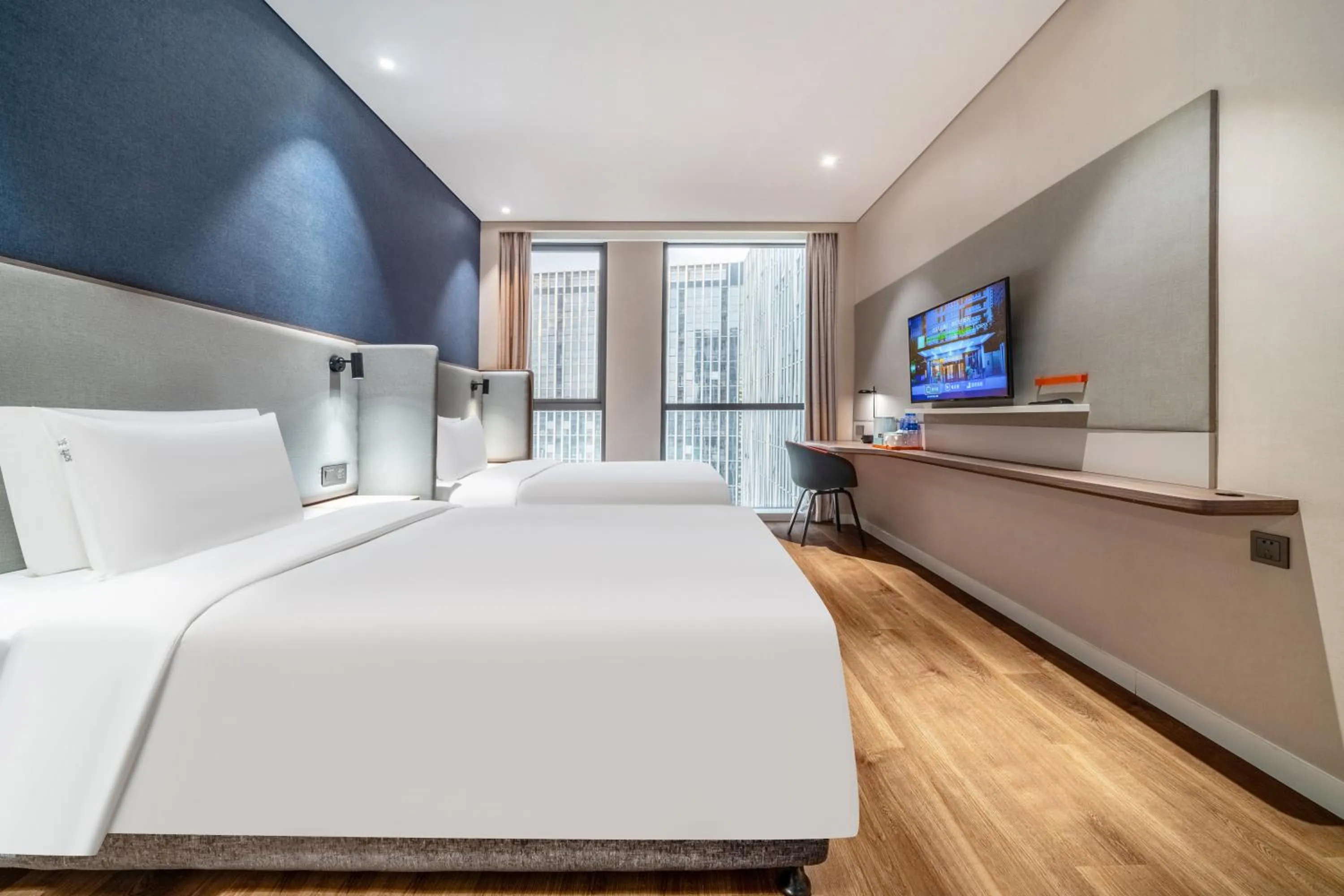 Bed in Holiday Inn Express Hangzhou Binjiang Aoti by IHG