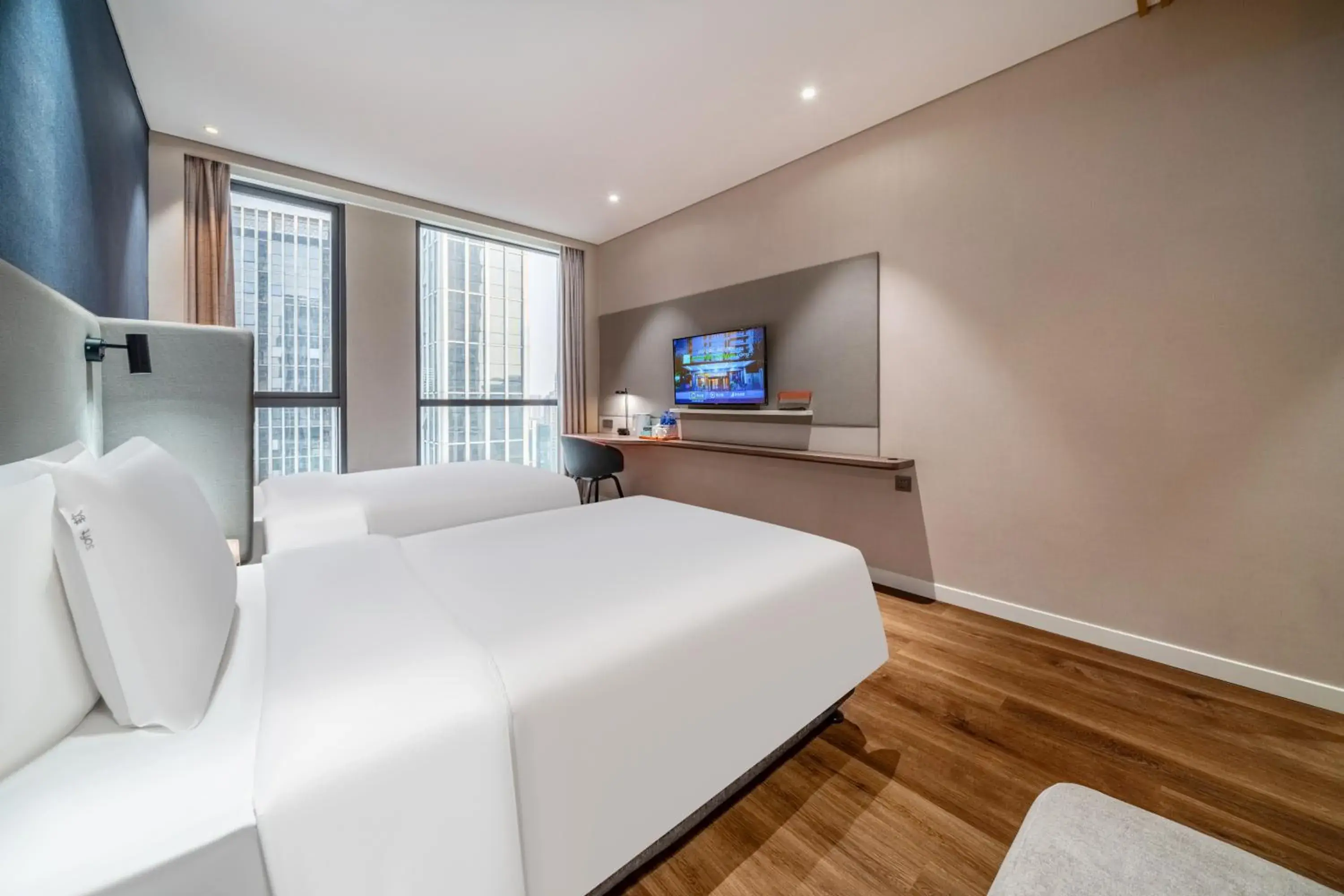 Bed in Holiday Inn Express Hangzhou Binjiang Aoti by IHG Bed in Holiday Inn Express Hangzhou Binjiang Aoti by IHG