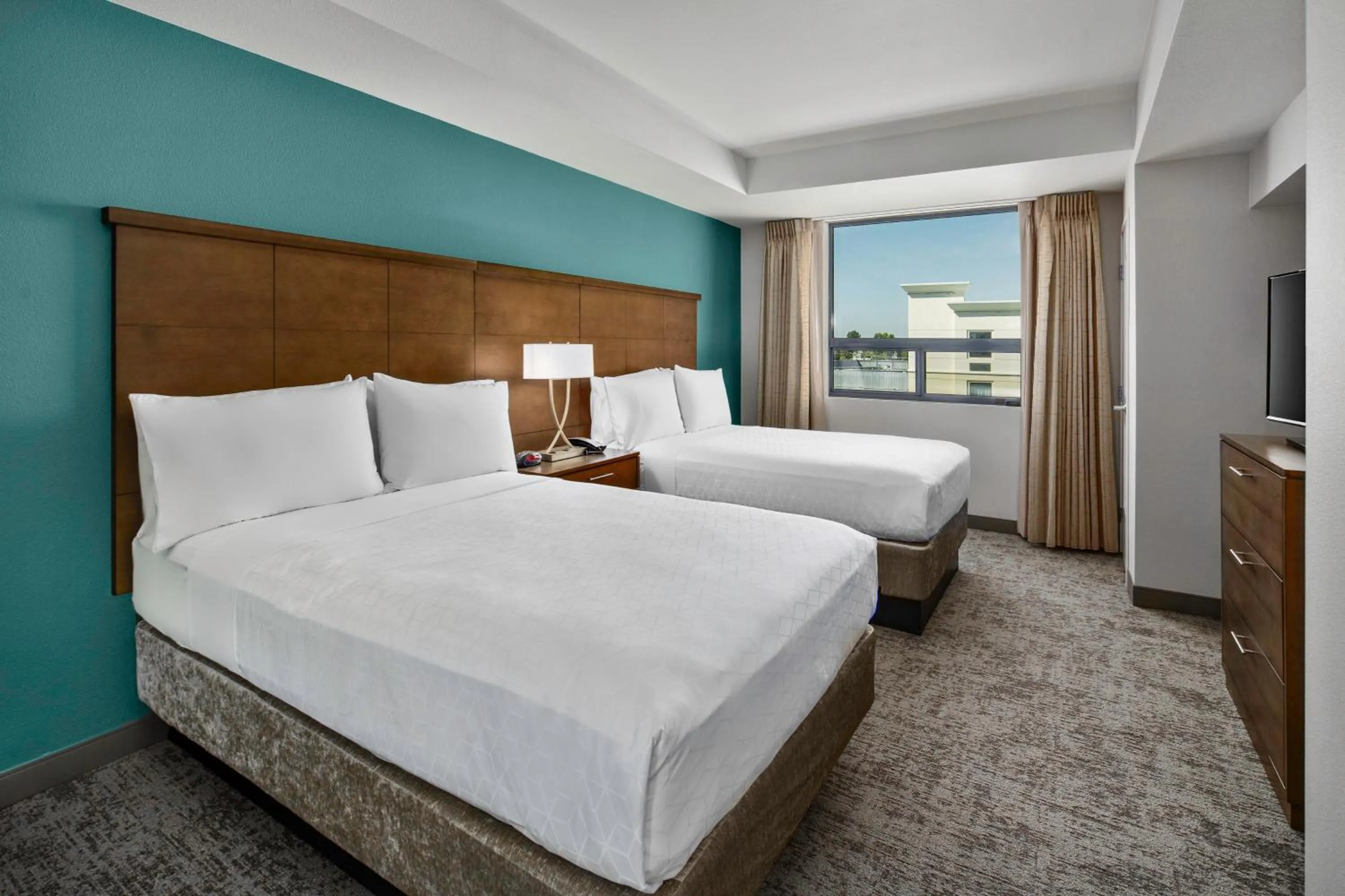 Photo of the whole room, Bed in Staybridge Suites Irvine - John Wayne Airport by IHG