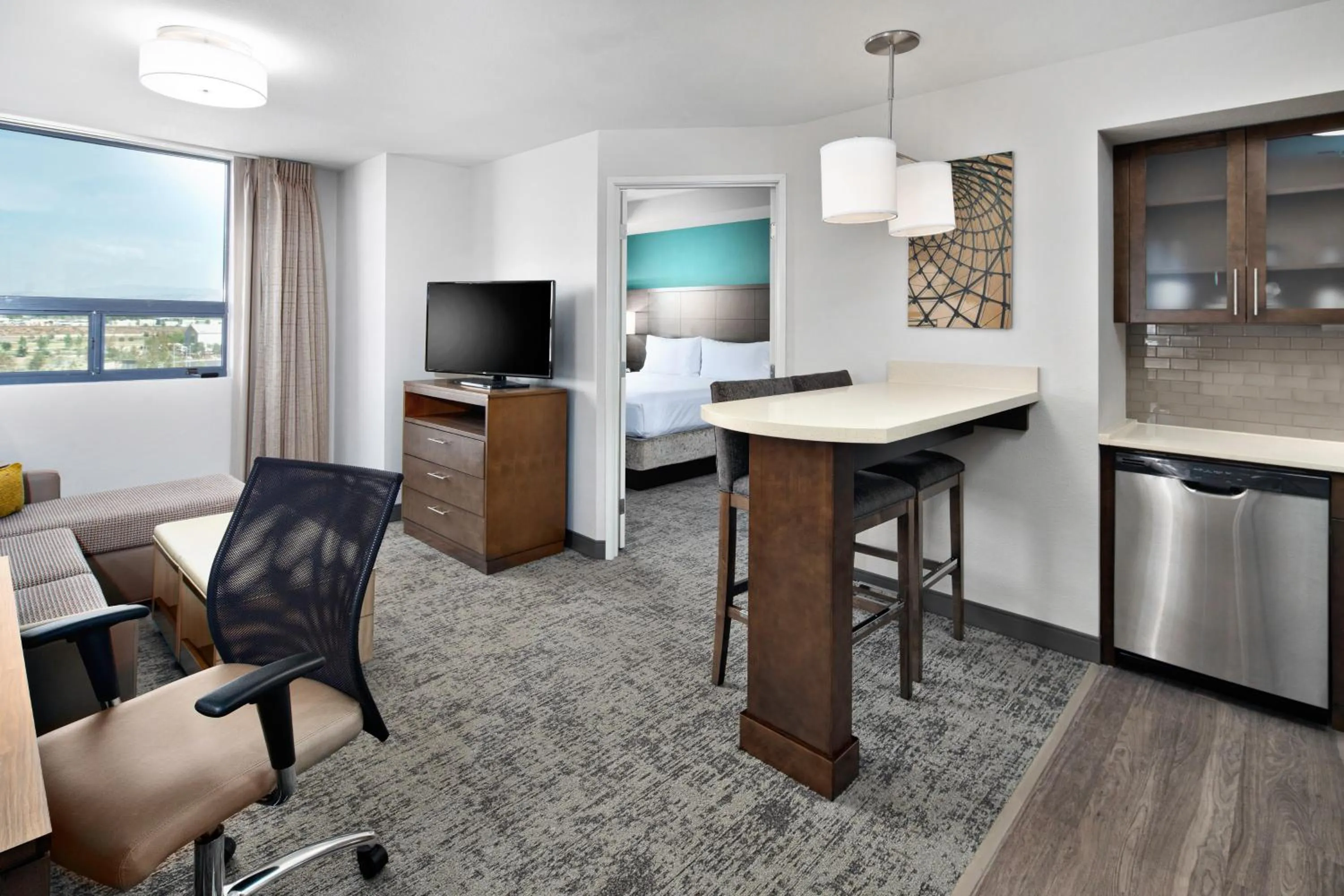 Living room in Staybridge Suites Irvine - John Wayne Airport by IHG