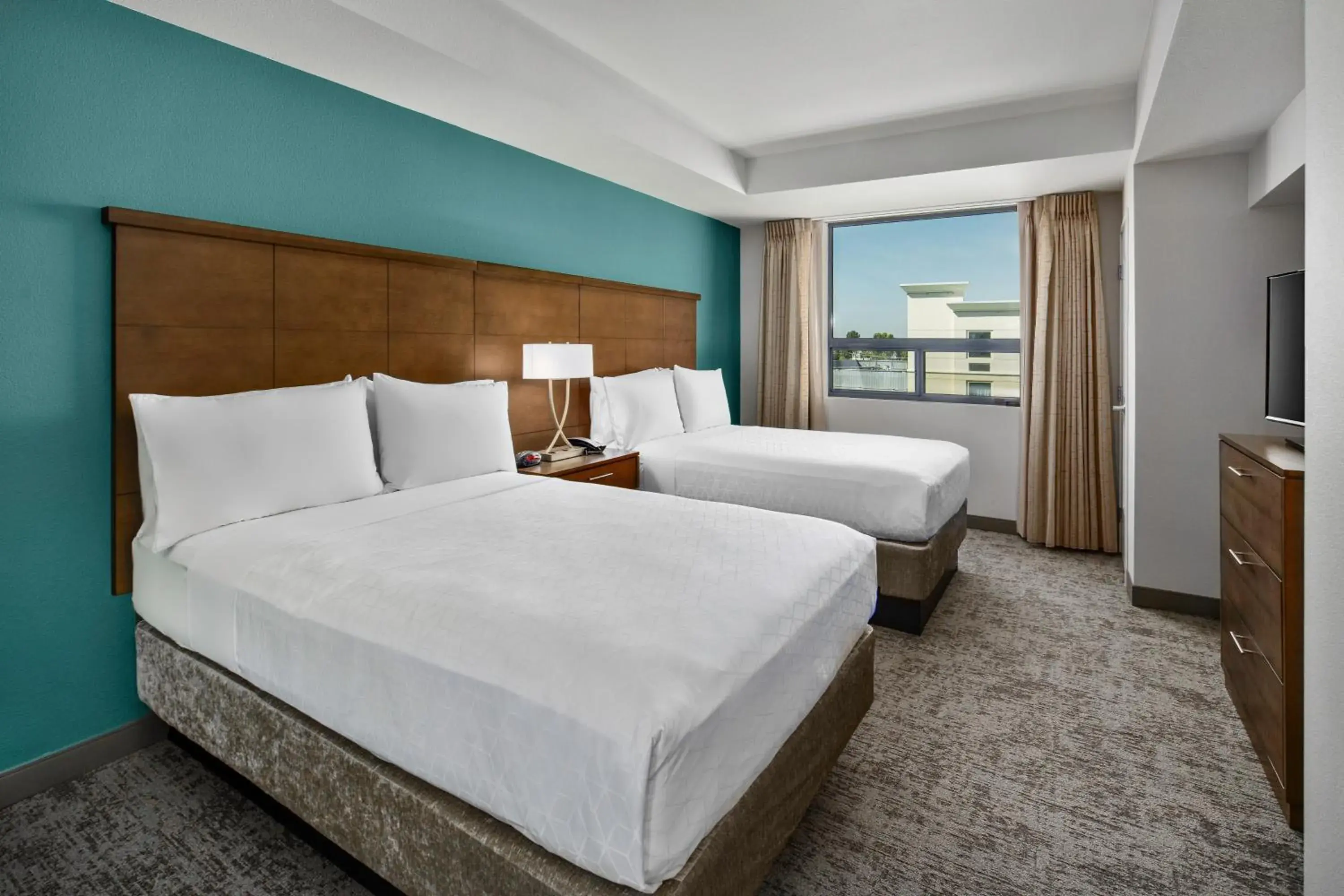 Two Bedroom Suite with One Queen Bed and Two Double Beds - Non-Smoking in Staybridge Suites Irvine - John Wayne Airport by IHG Two Bedroom Suite with One Queen Bed and Two Double Beds - Non-Smoking in Staybridge Suites Irvine - John Wayne Airport by IHG