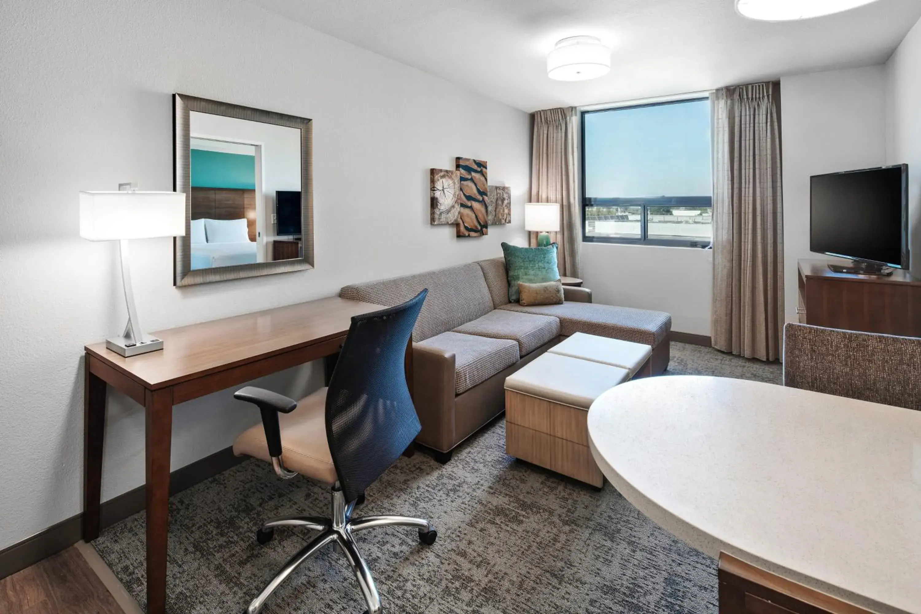 Living room in Staybridge Suites Irvine - John Wayne Airport by IHG Living room in Staybridge Suites Irvine - John Wayne Airport by IHG