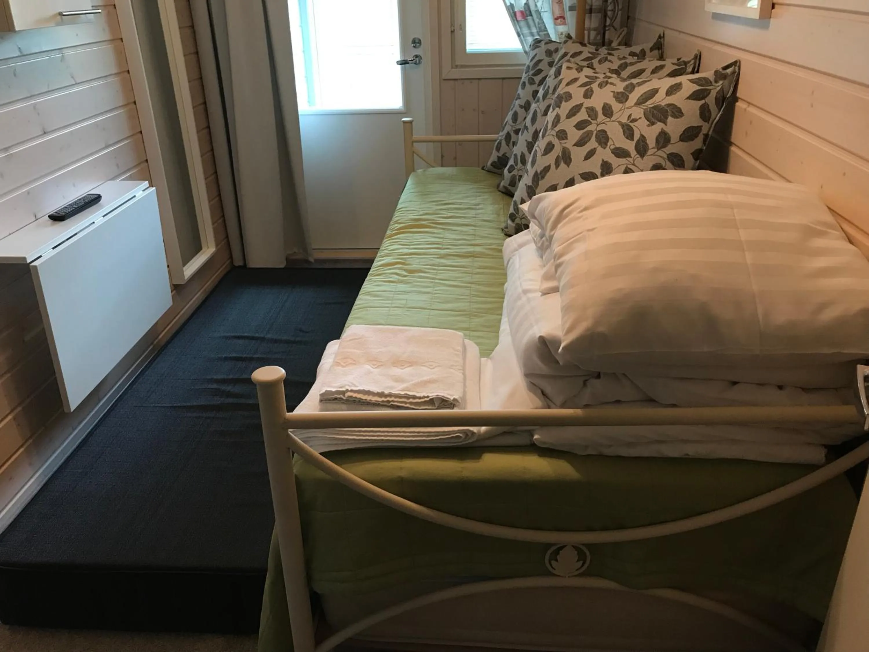 Bed in Rantakatti Apartments