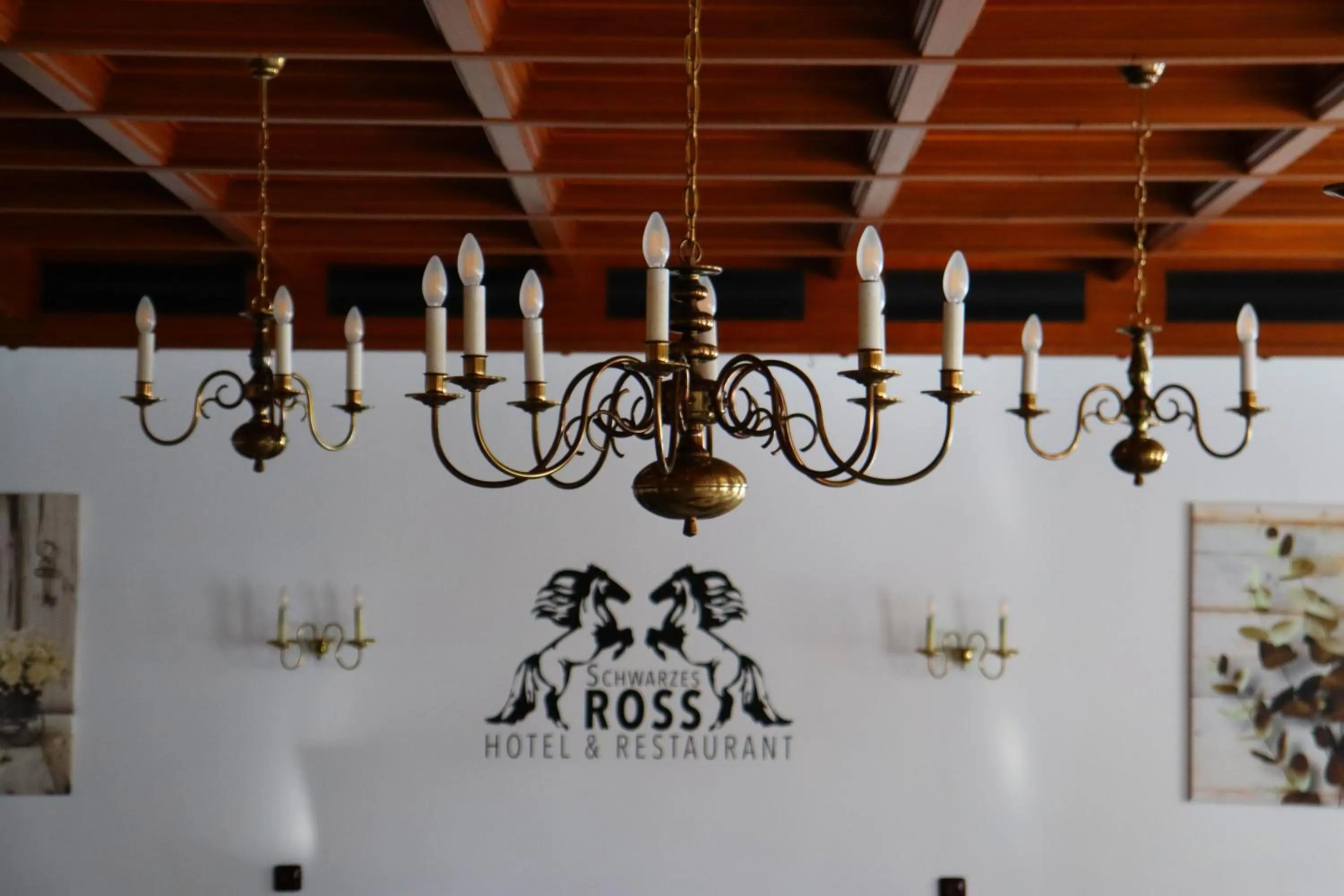 Property logo or sign in Schwarzes Ross Hotel & Restaurant Oberwiesenthal