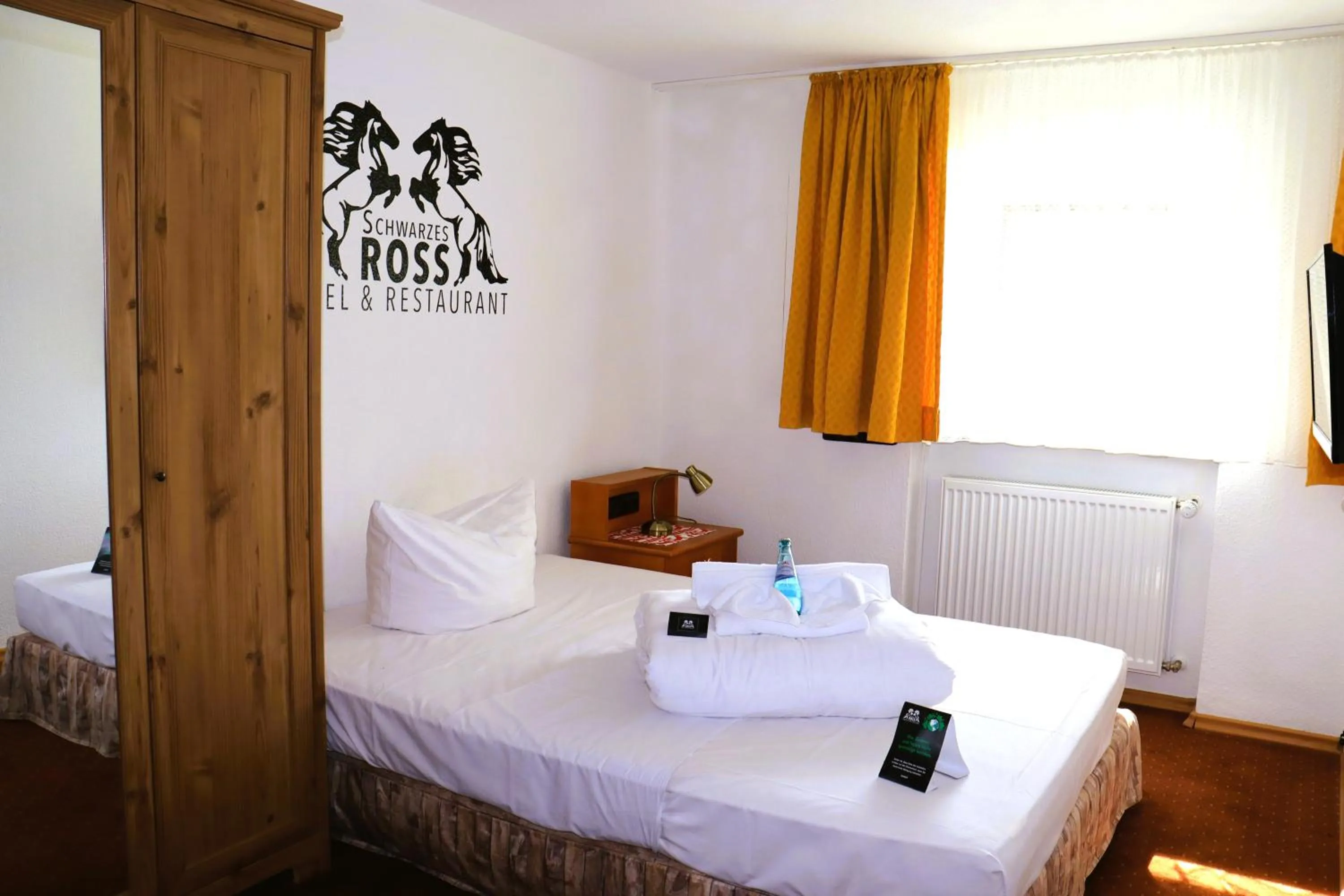 Photo of the whole room, Bed in Schwarzes Ross Hotel & Restaurant Oberwiesenthal