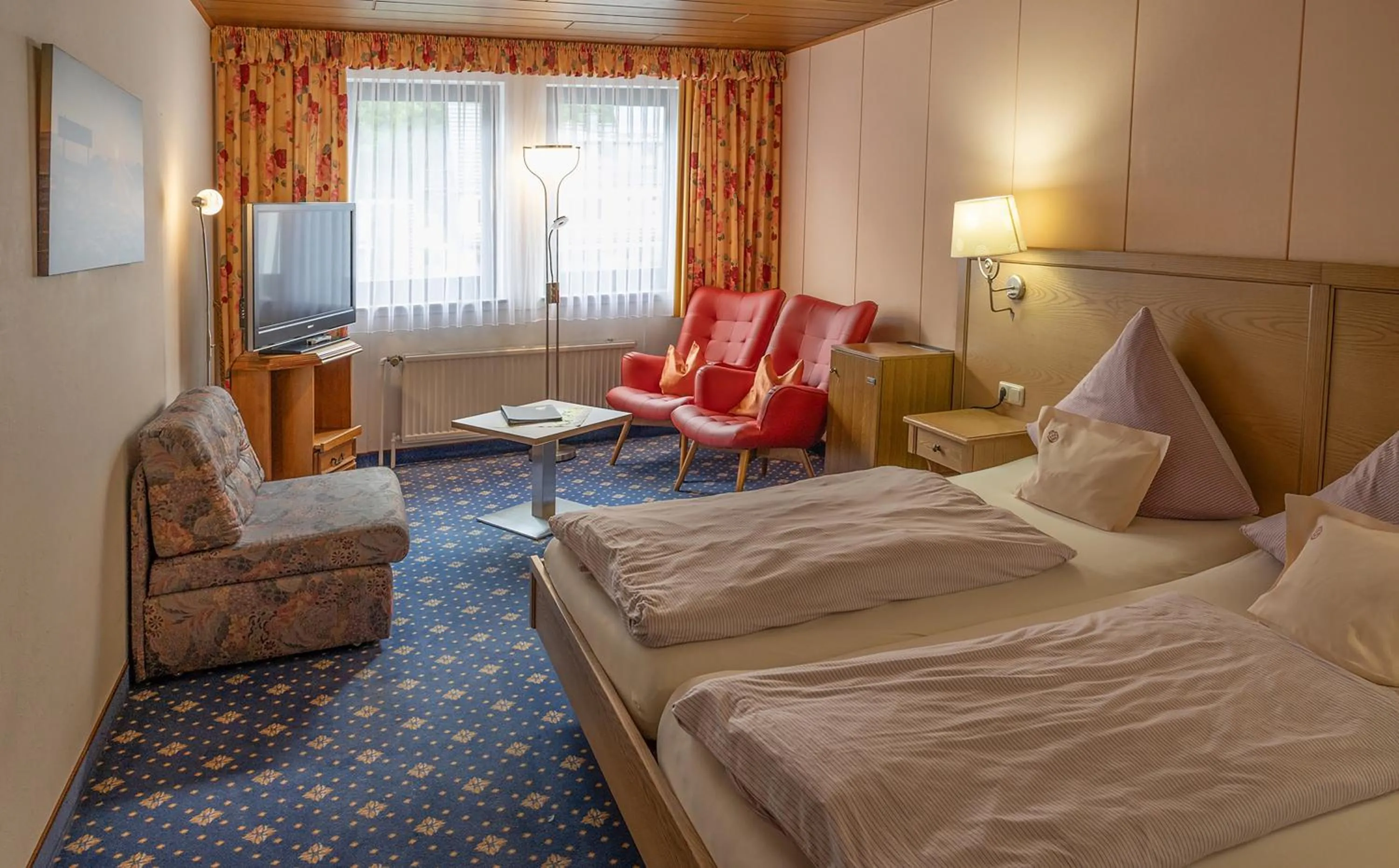 Bed in Sporthotel Göbel Garni