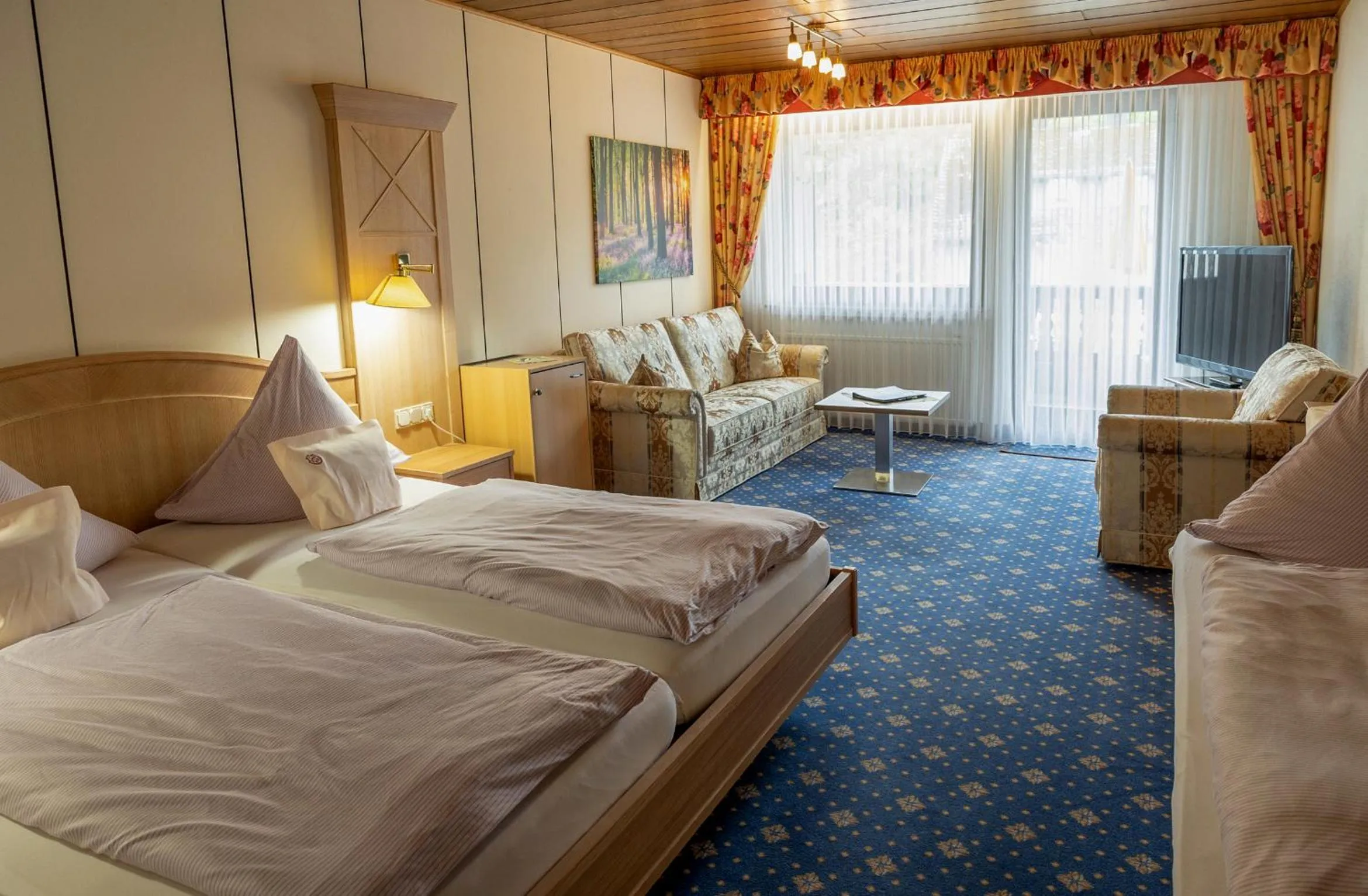 Bed in Sporthotel Göbel Garni