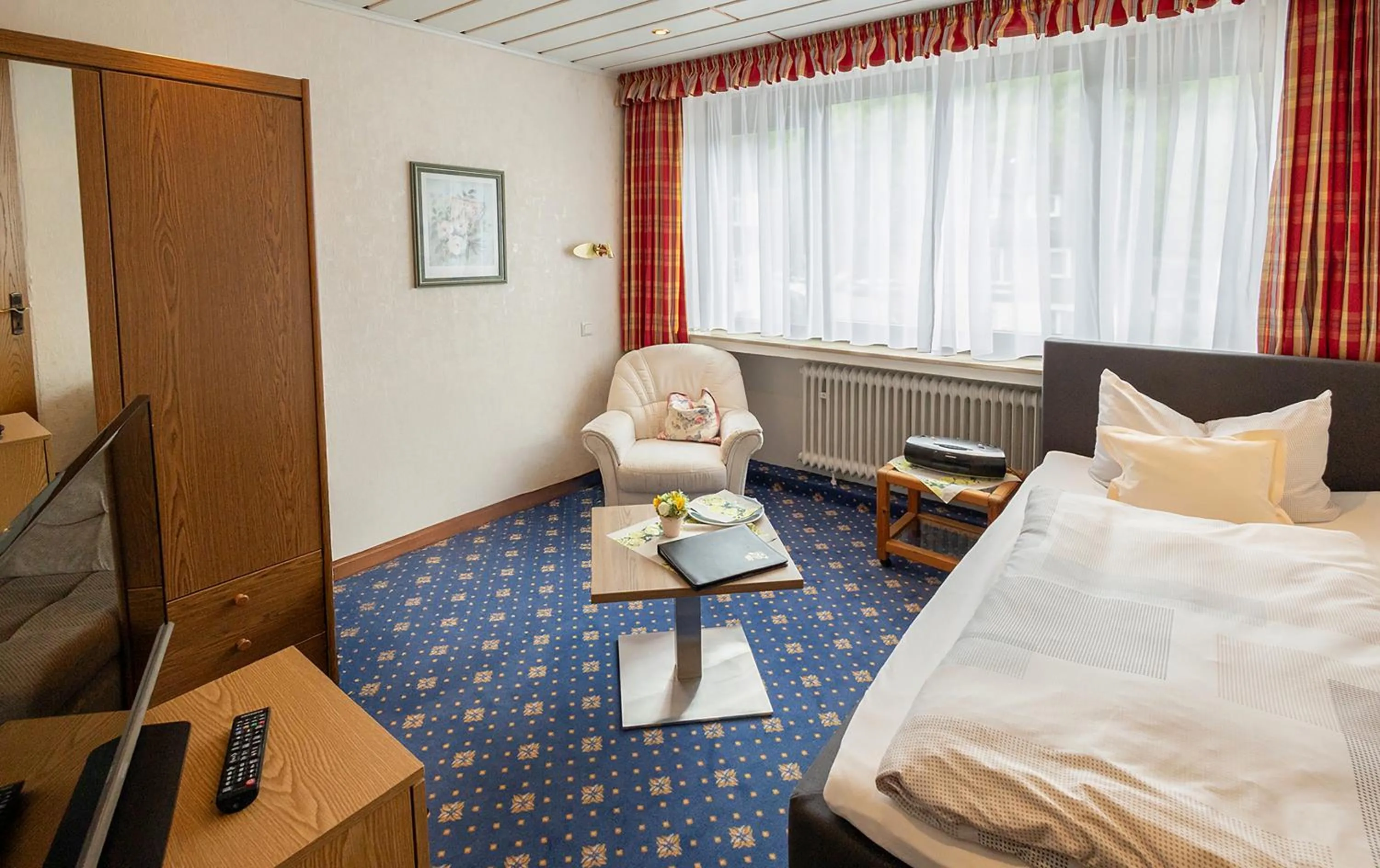 Bed in Sporthotel Göbel Garni