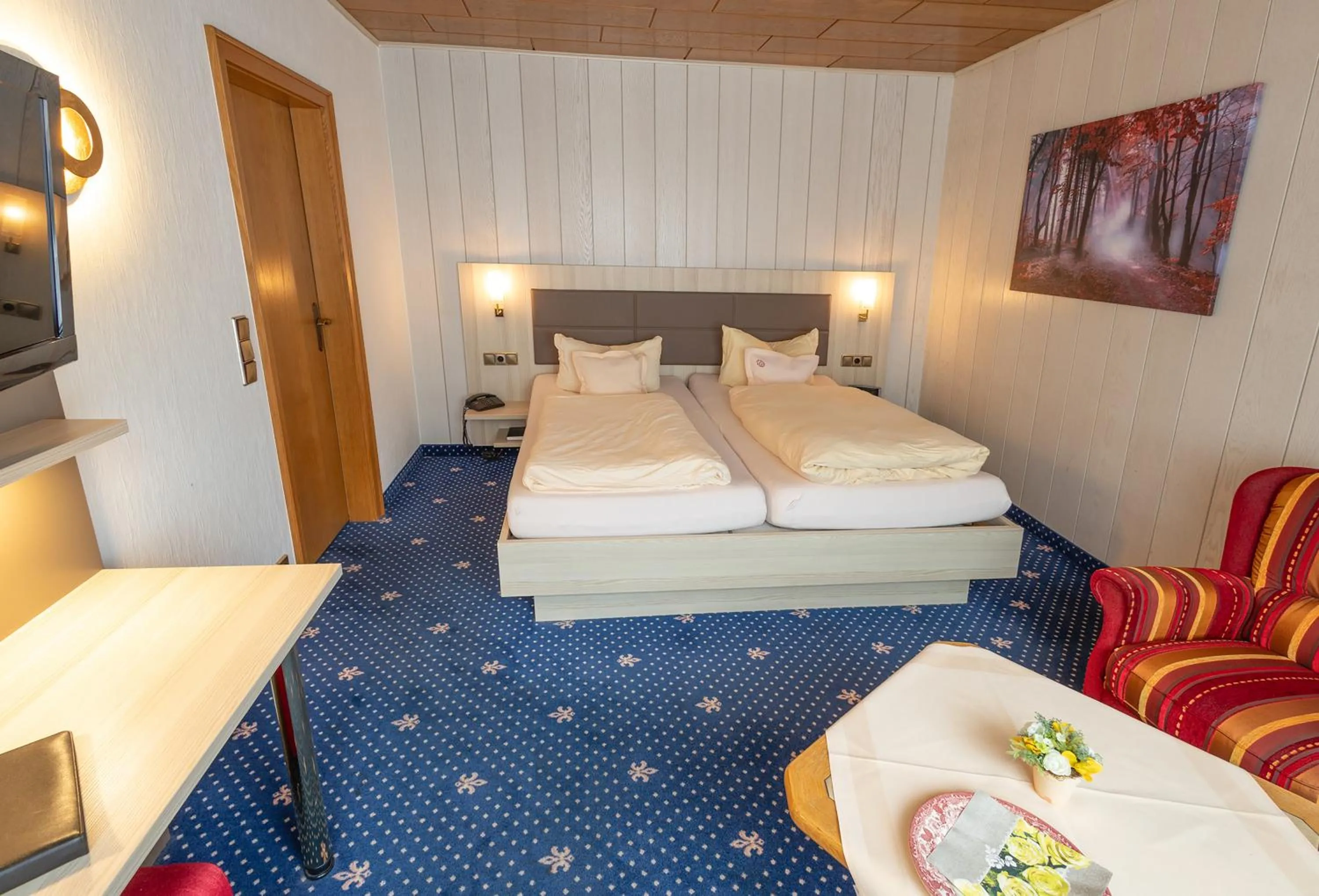 Bed in Sporthotel Göbel Garni