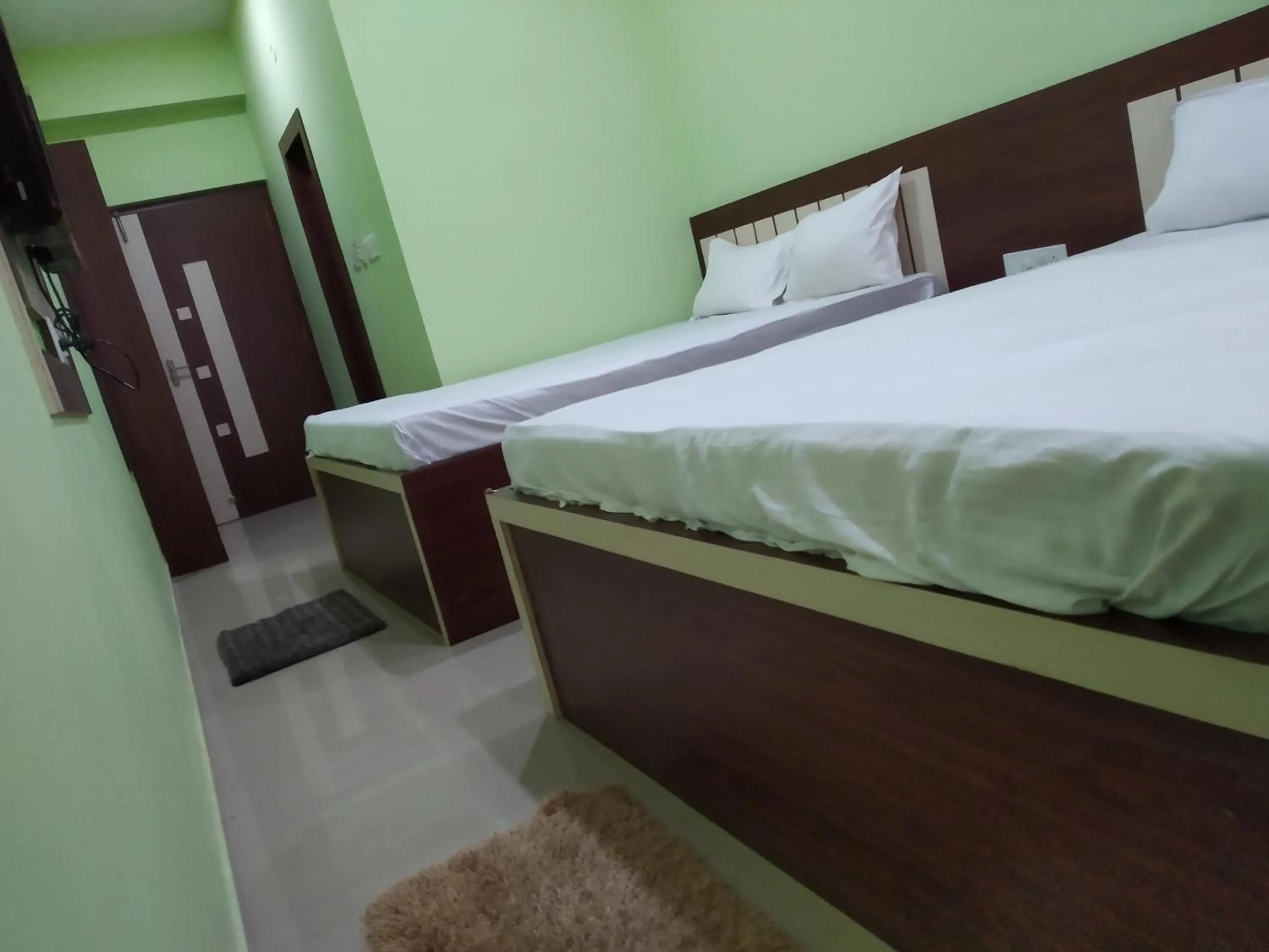 Photo of the whole room, Bed in Hotel Shree Hari