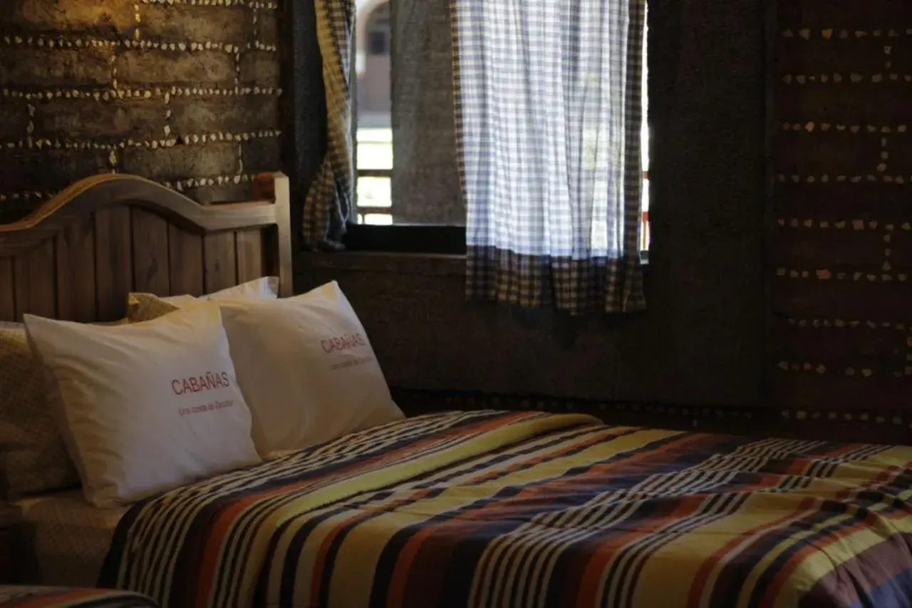 Bed in Hotel y Cabañas una Cosita de Zacatlán Bed in Hotel y Cabañas una Cosita de Zacatlán