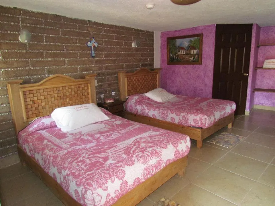 Bed in Hotel y Cabañas una Cosita de Zacatlán