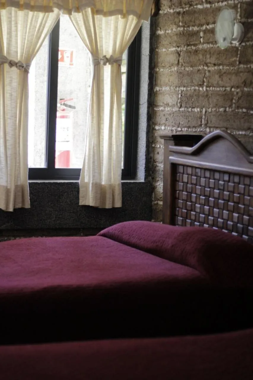 Bed in Hotel y Cabañas una Cosita de Zacatlán