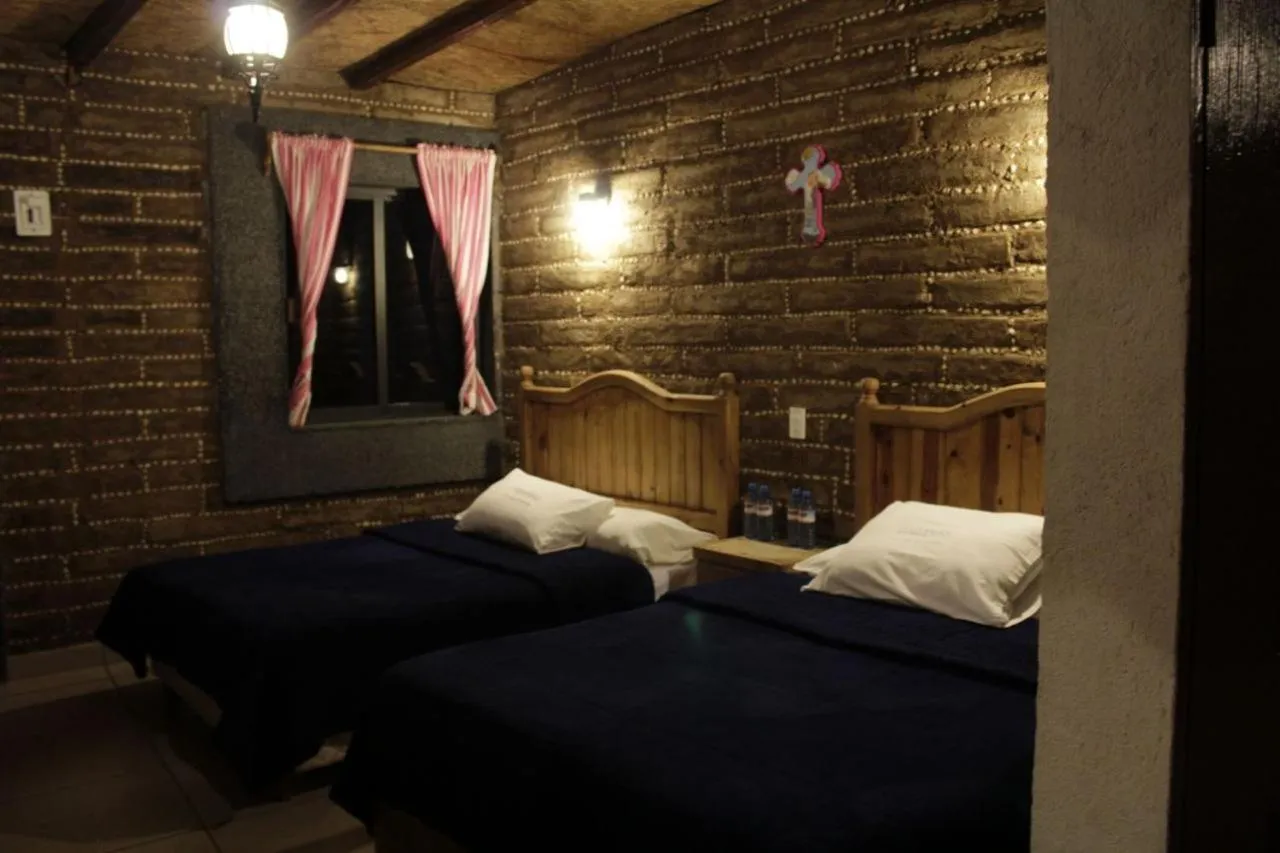 Bed in Hotel y Cabañas una Cosita de Zacatlán