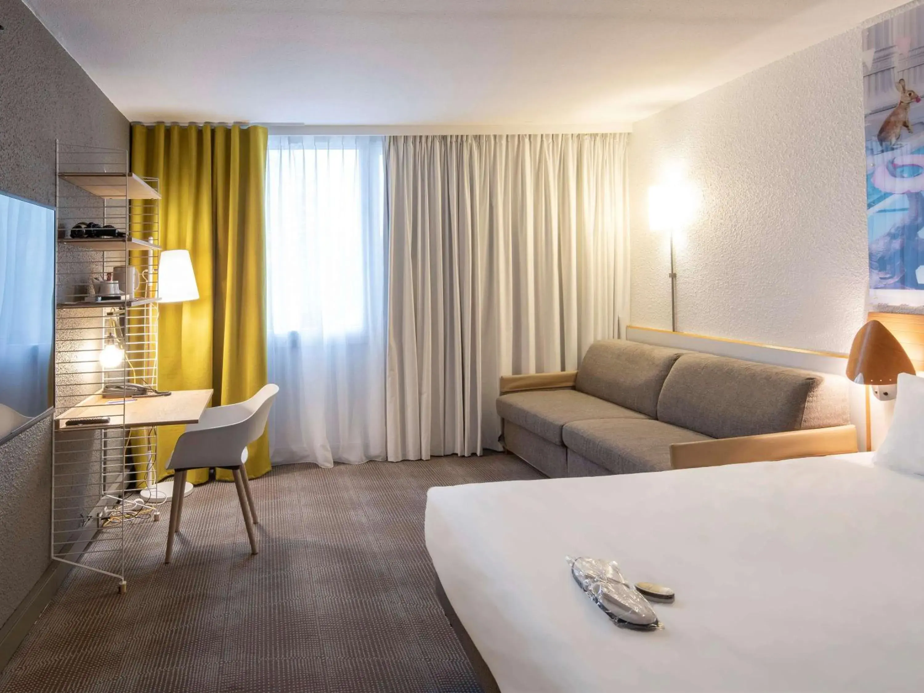 Bed in Novotel Dijon Sud Bed in Novotel Dijon Sud