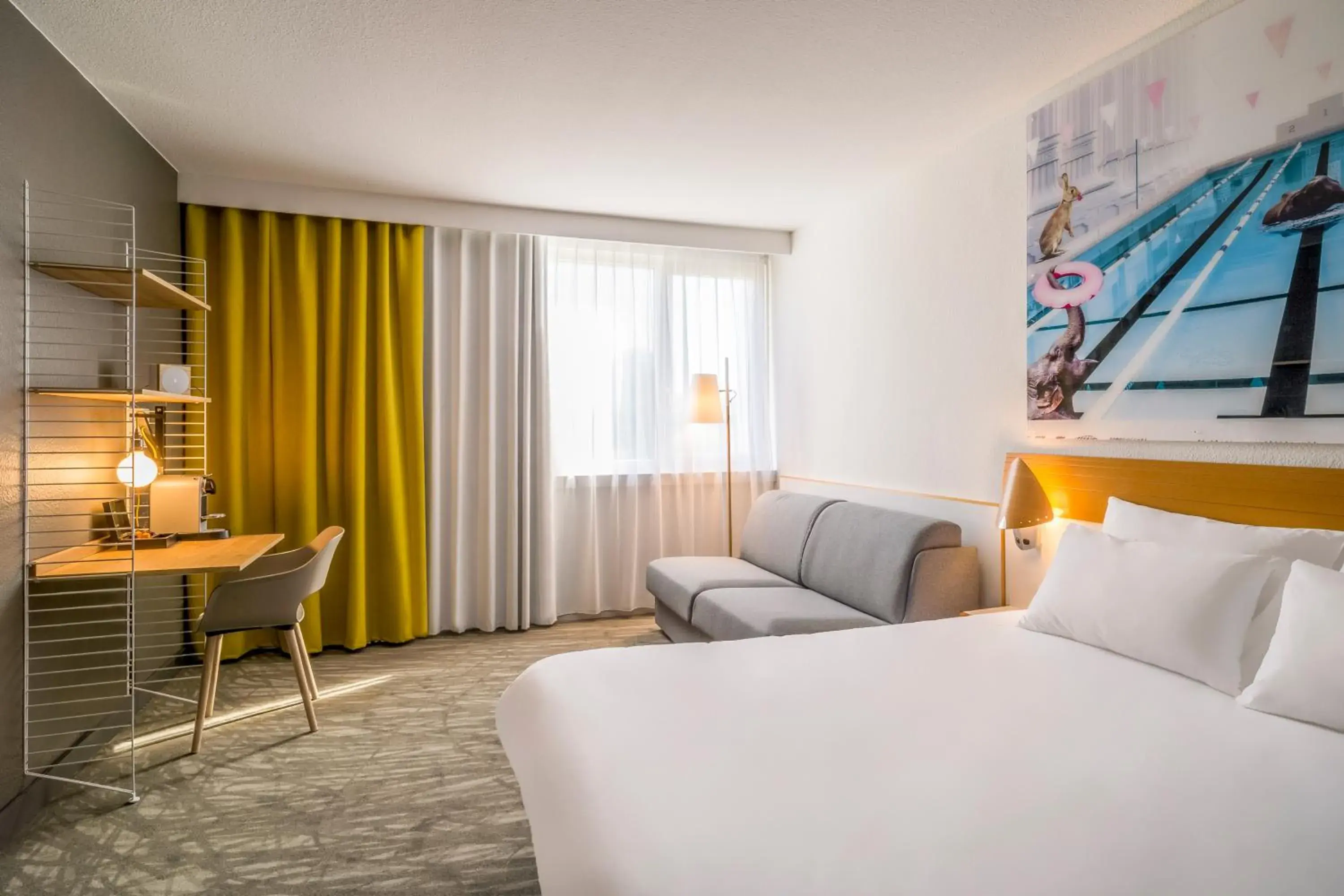 Photo of the whole room, Bed in Novotel Dijon Sud Photo of the whole room, Bed in Novotel Dijon Sud