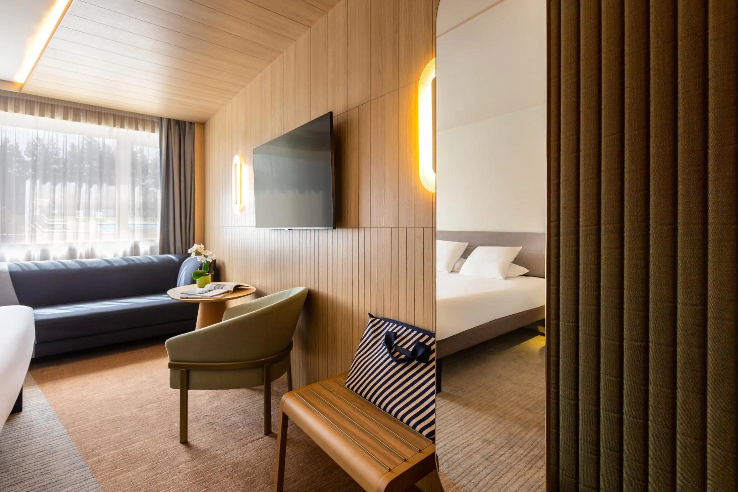 Seating area, Bed in Novotel Nancy