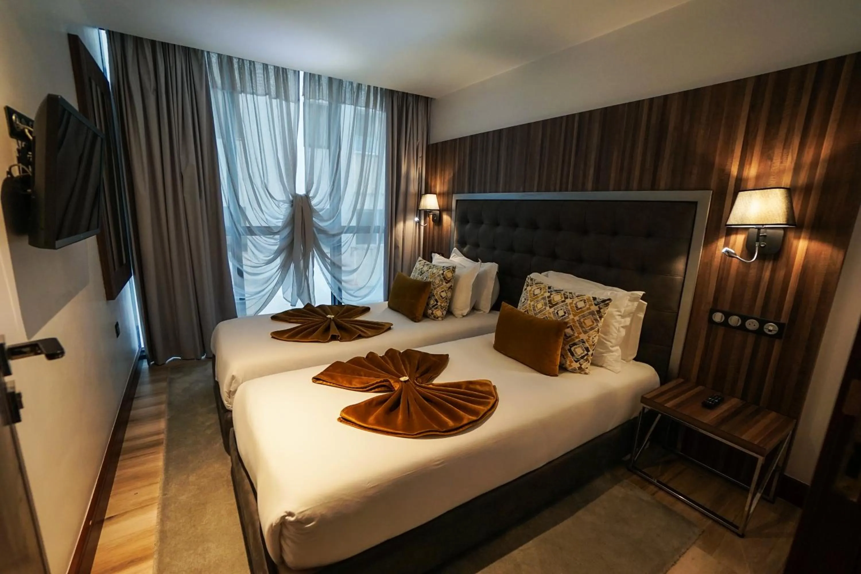 Bed in SBN Suite Hôtel