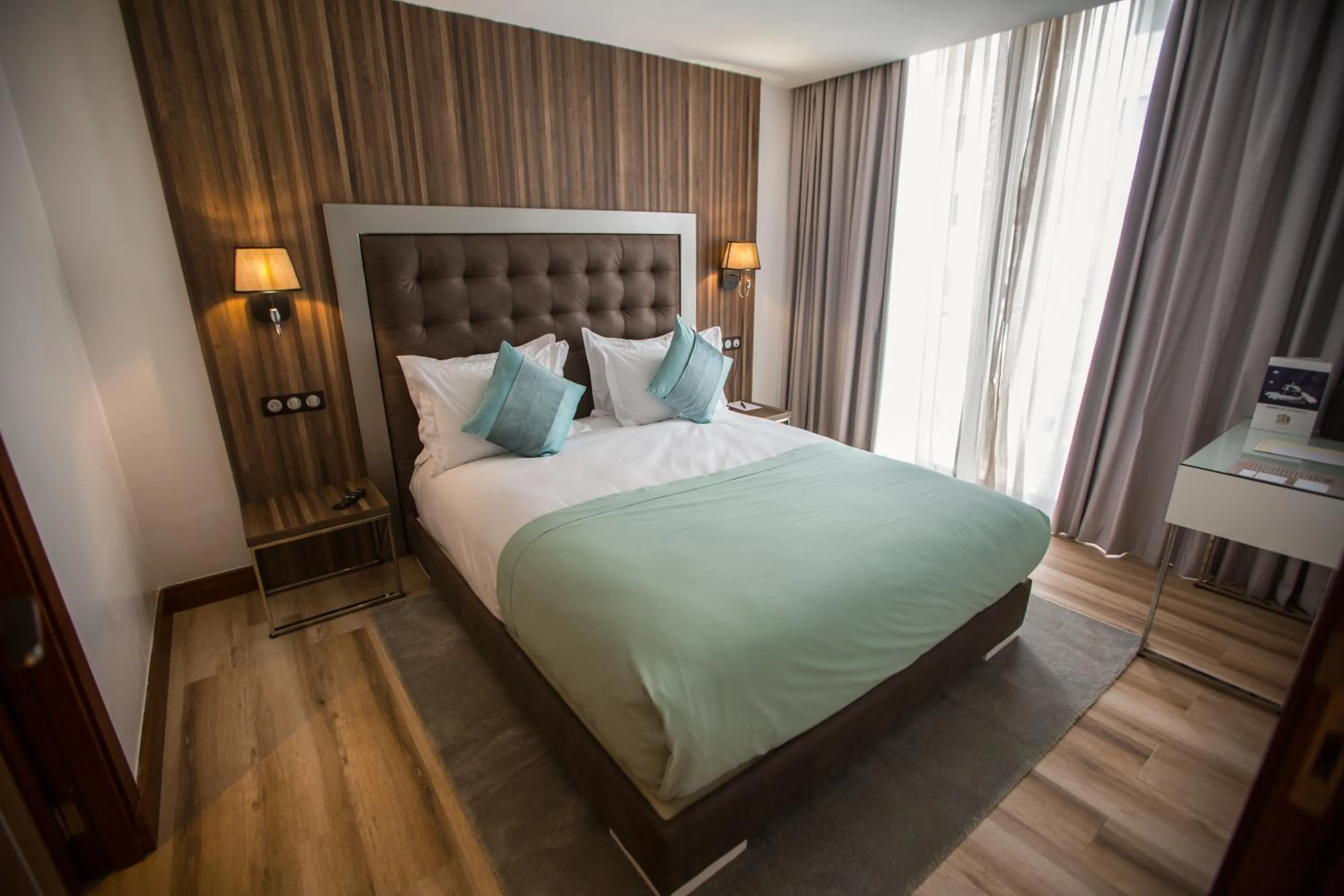 Bed in SBN Suite Hôtel