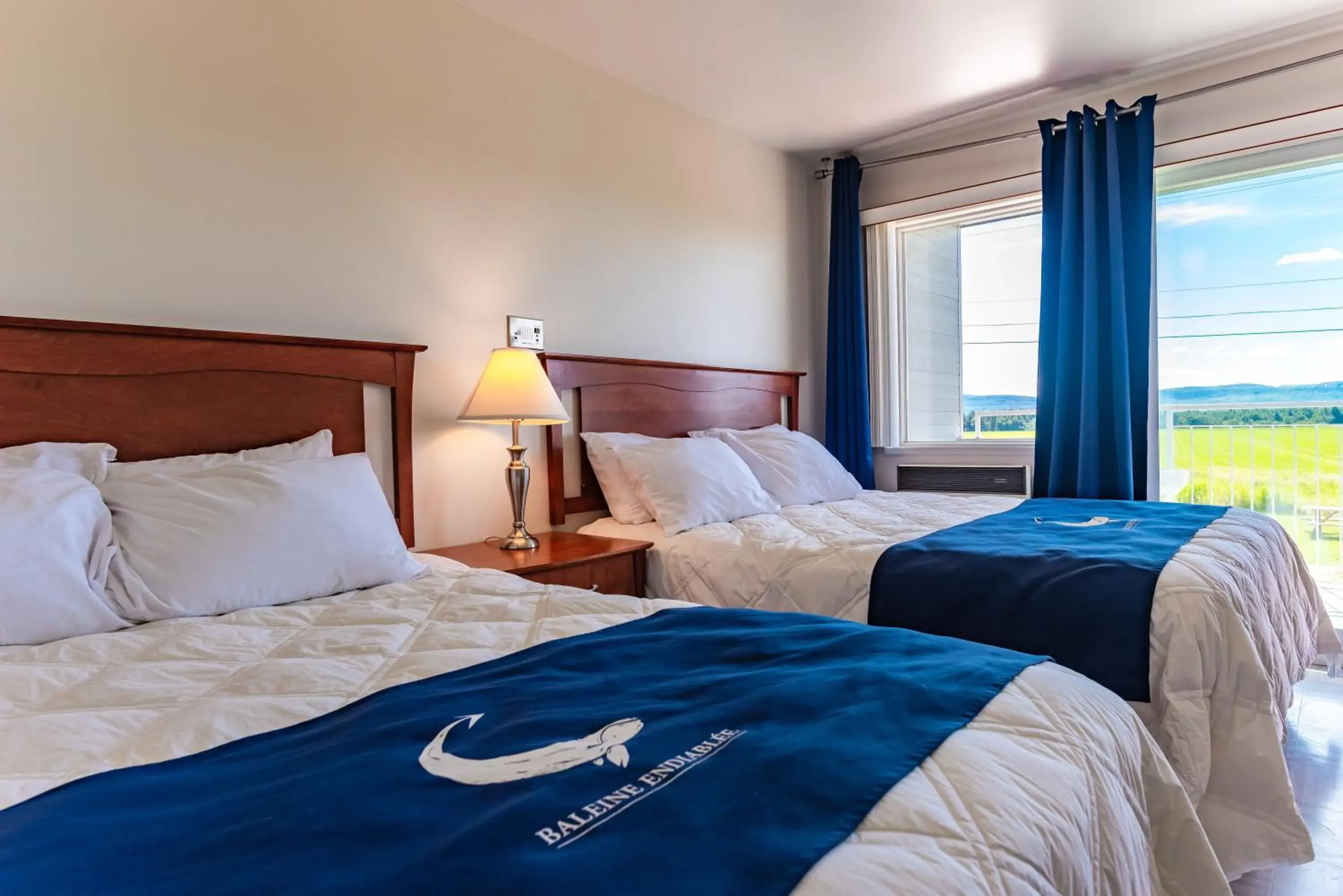 Queen Room with Two Queen Beds - Disability Access in La Baleine Endiablée Microbrasserie Queen Room with Two Queen Beds - Disability Access in La Baleine Endiablée Microbrasserie