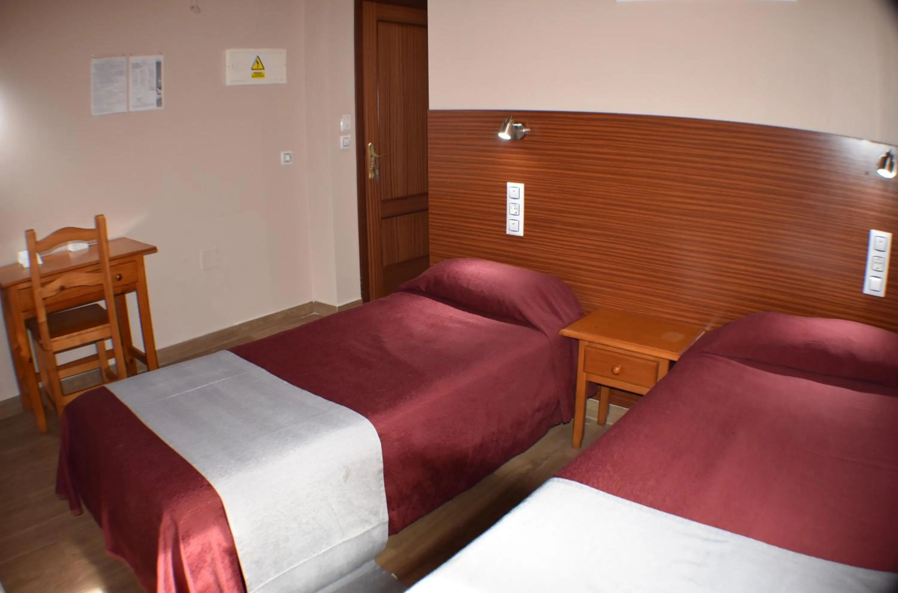Photo of the whole room, Bed in Hostal Alamare