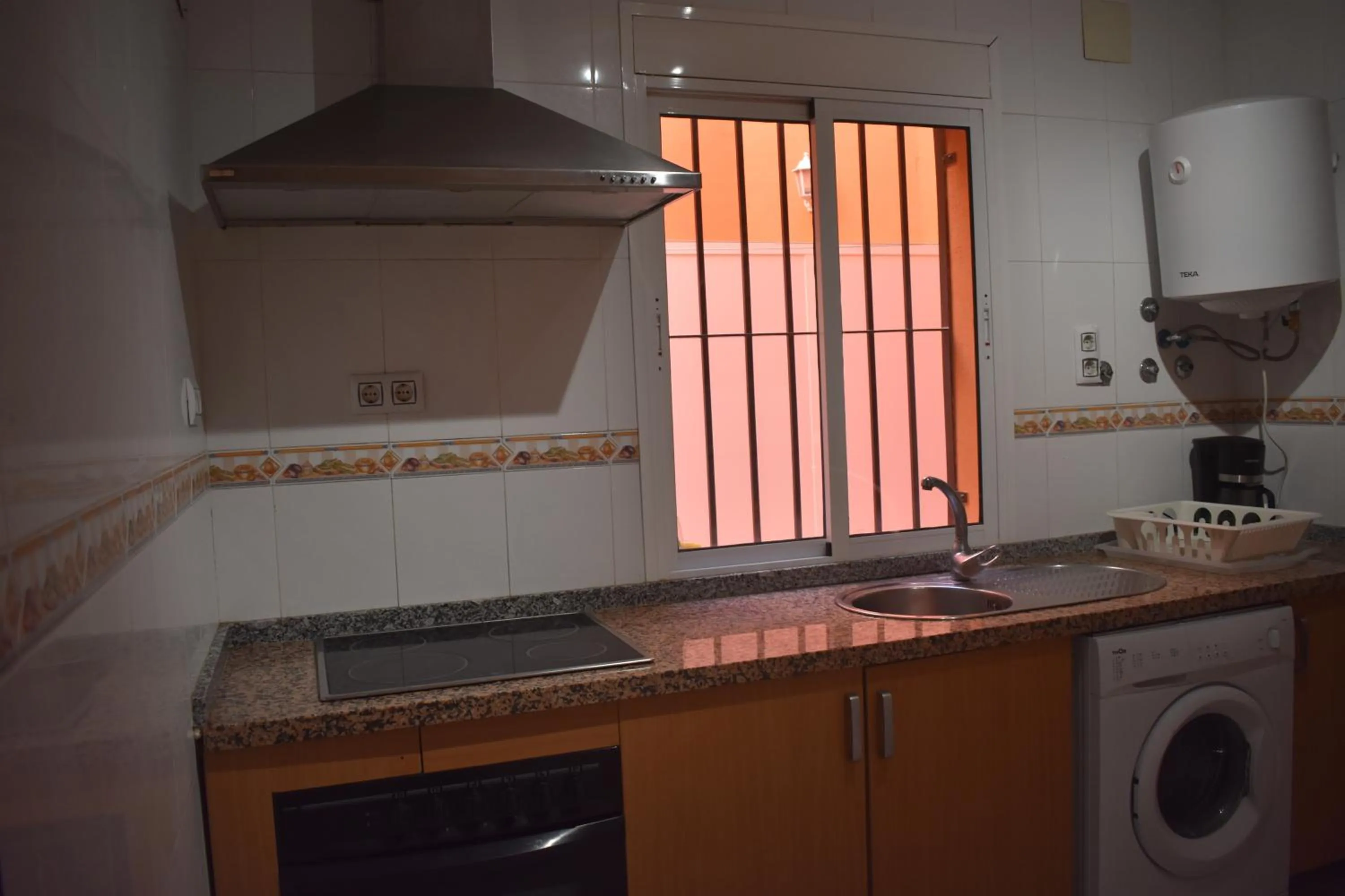 Kitchen or kitchenette in Hostal Alamare