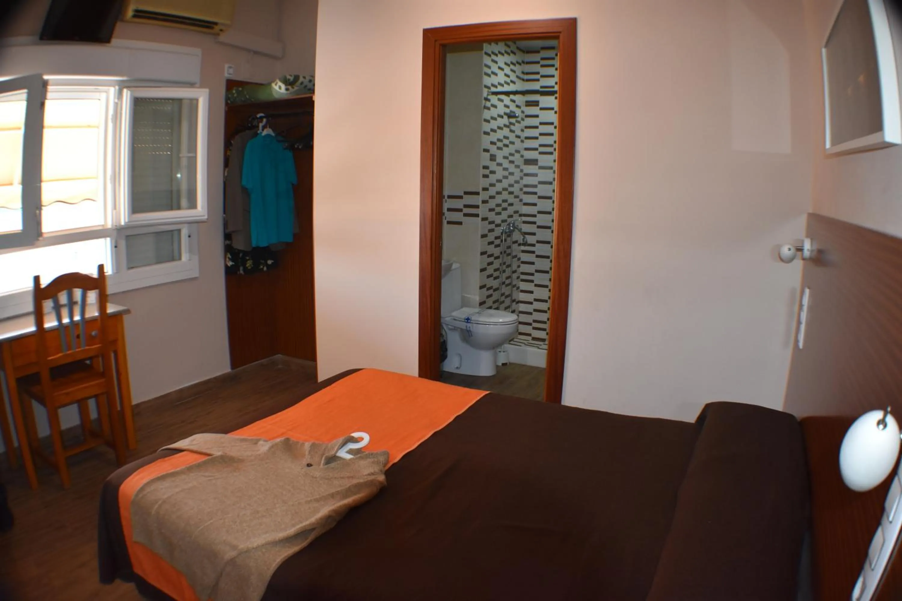 Bed in Hostal Alamare