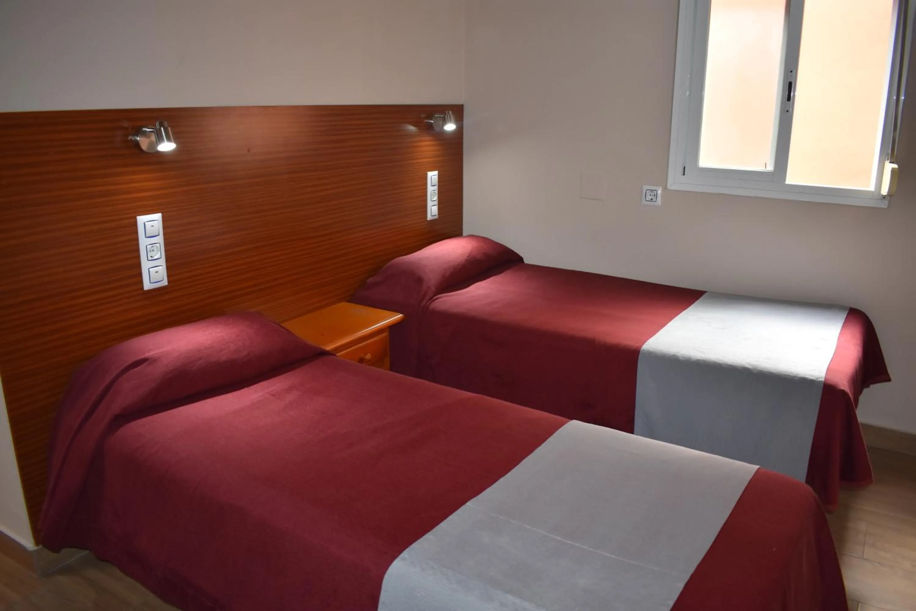 Bed in Hostal Alamare