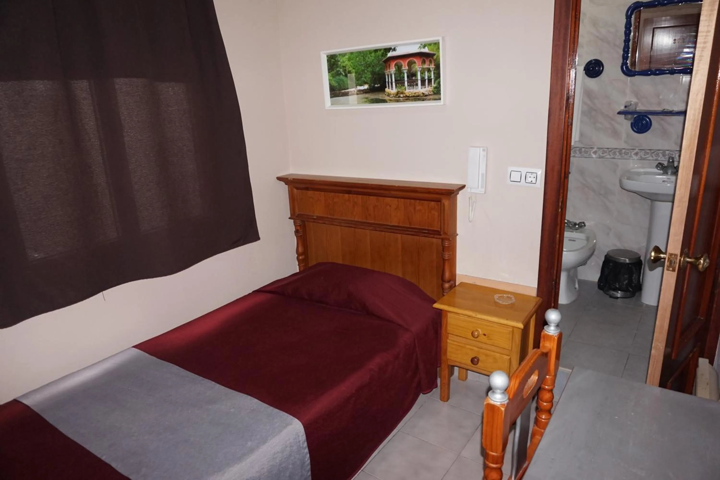 Bed in Hostal Alamare