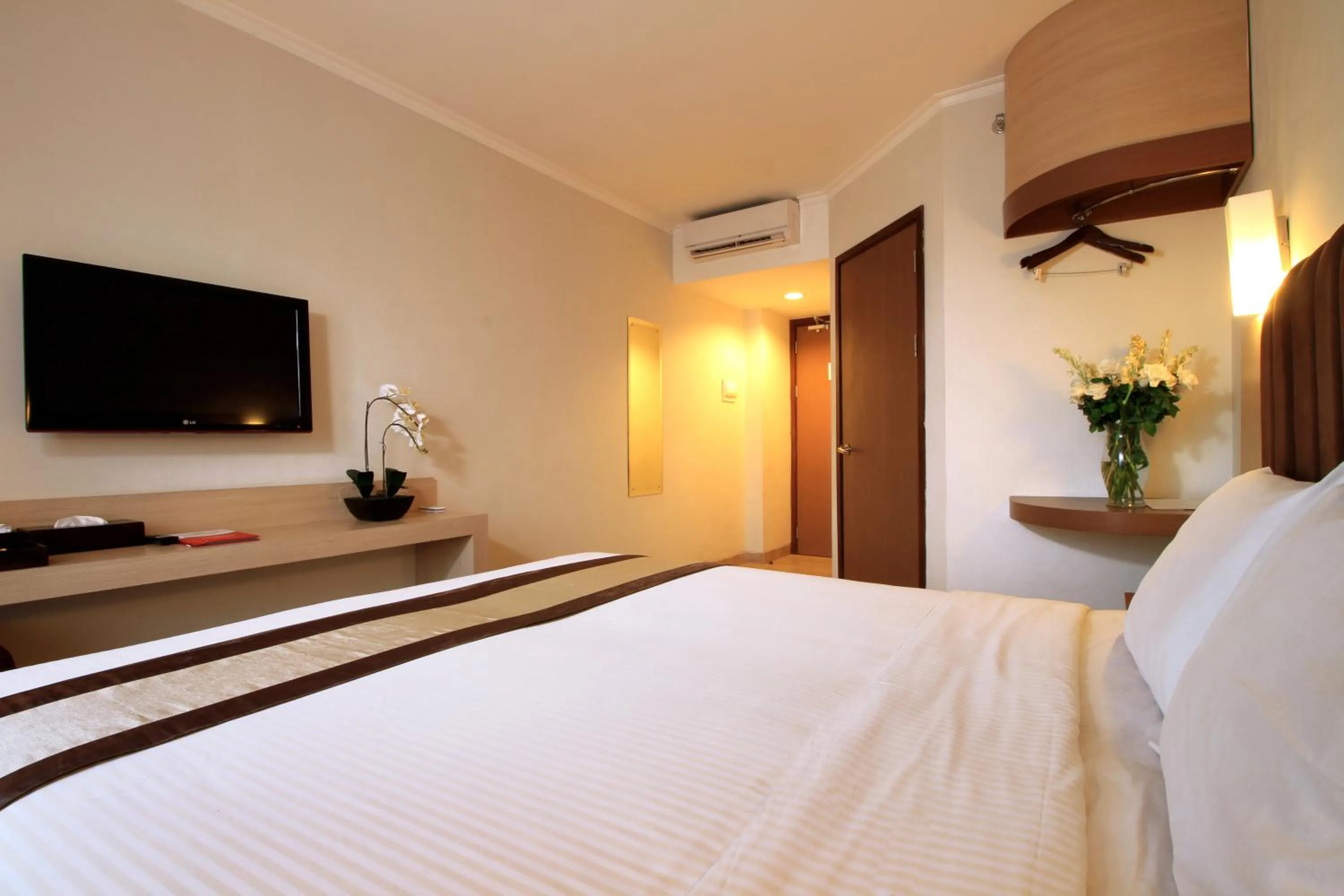 Bed in Bueno Colombo Hotel Yogyakarta