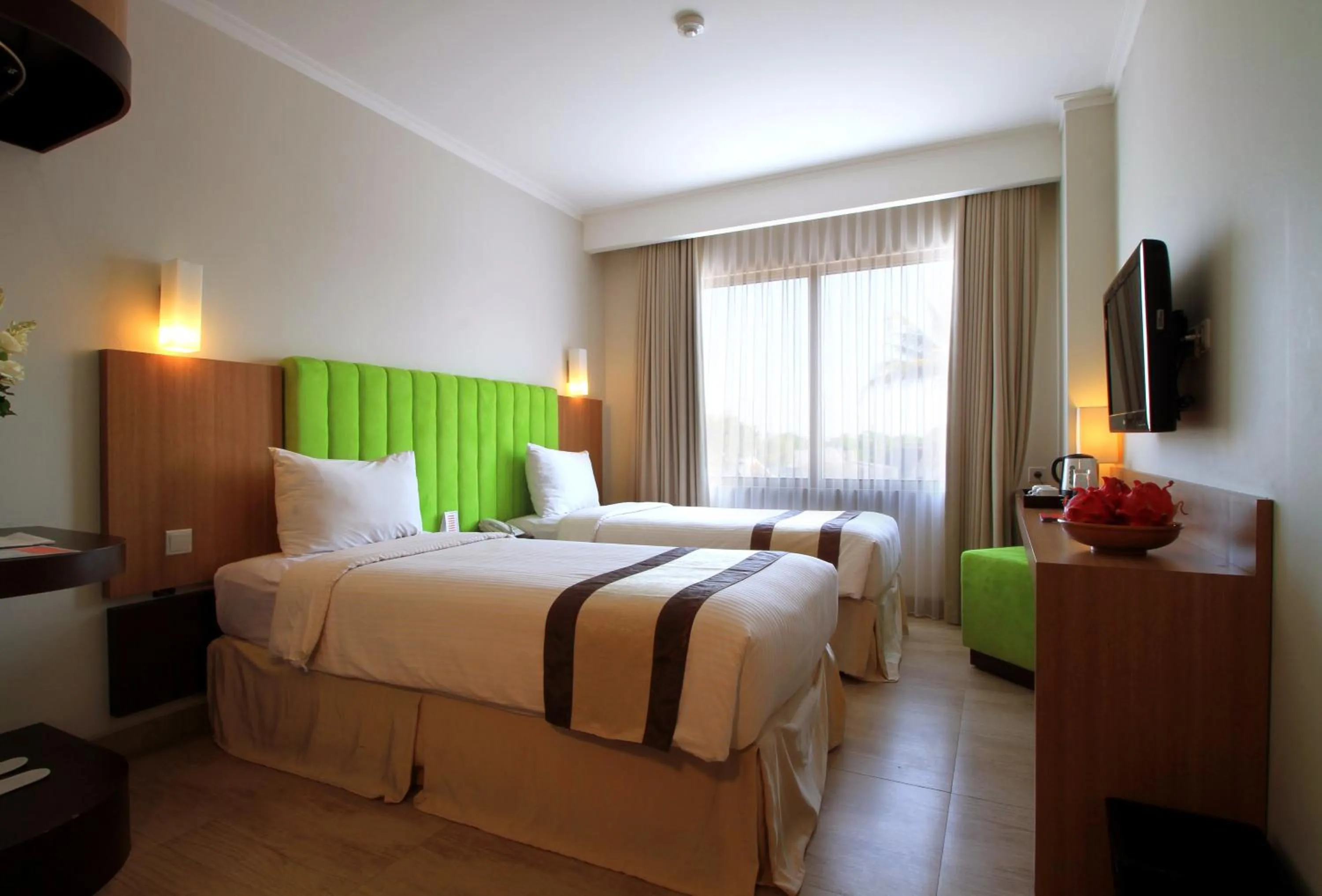 Bed in Bueno Colombo Hotel Yogyakarta