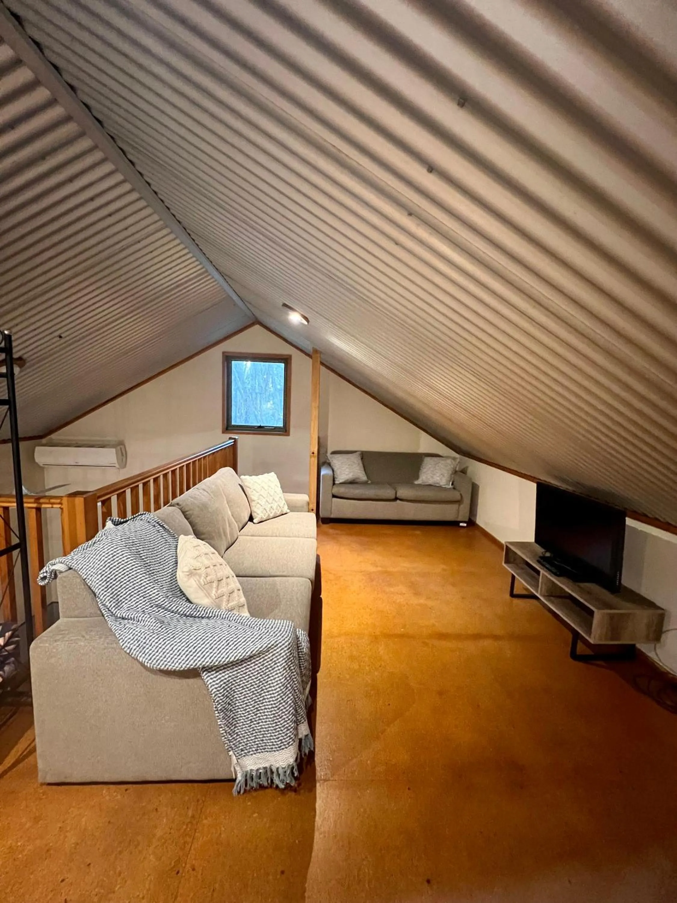 Seating area, Bed in The Oasis at One Mile Beach