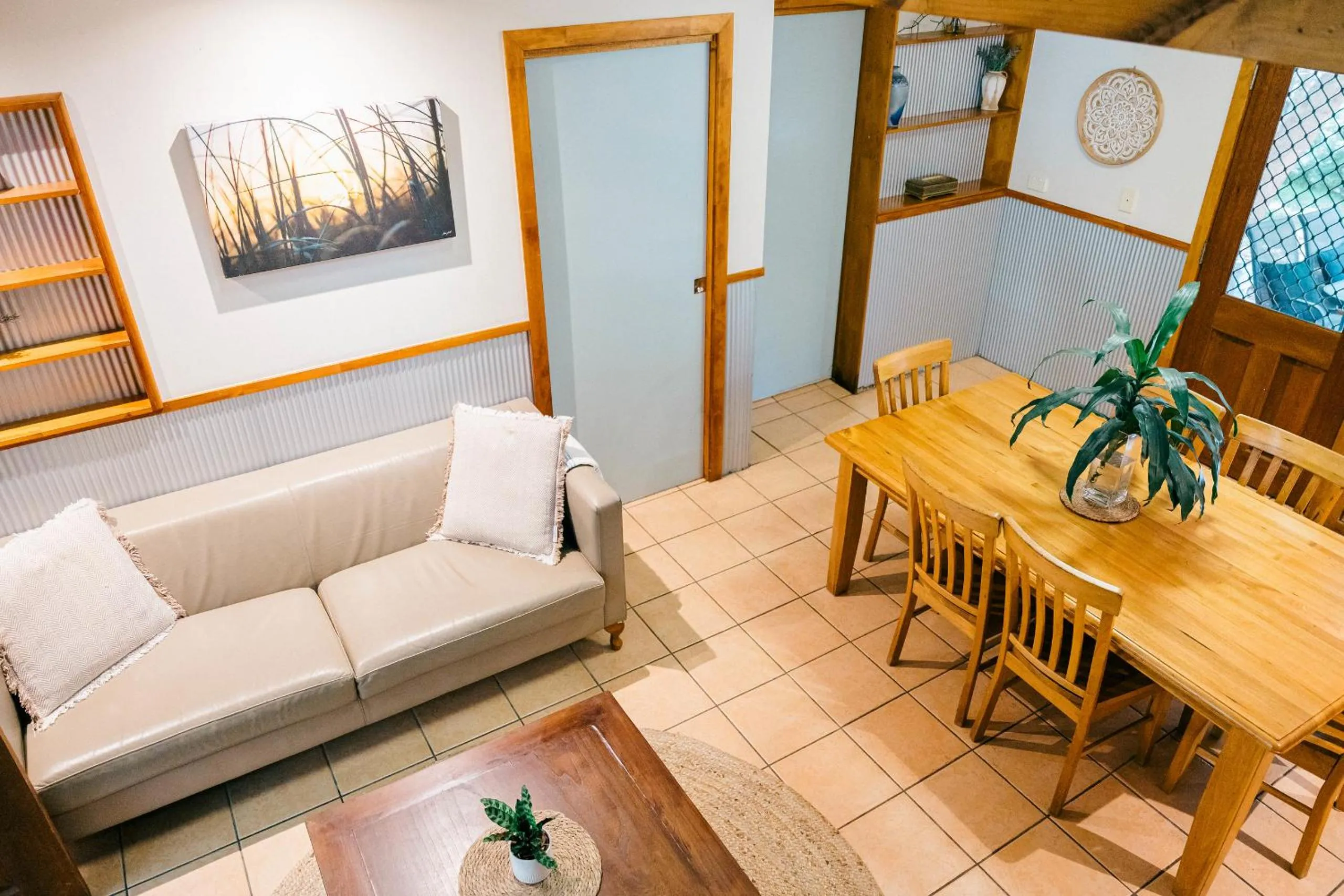 Living room in The Oasis at One Mile Beach